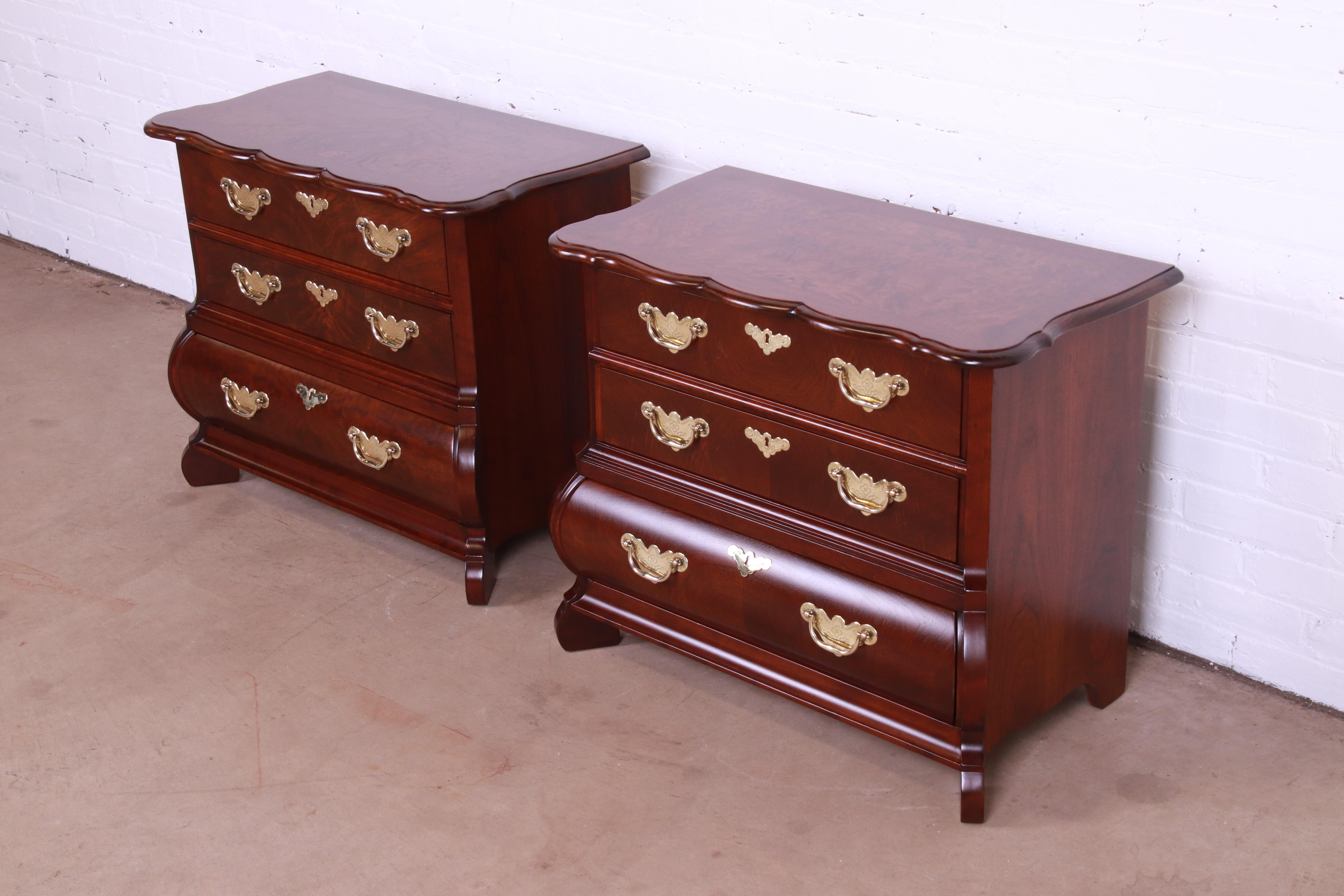 A gorgeous pair of Italian or French Provincial style bombay chest commodes or nightstands

By Baker Furniture

USA, Circa 1980s

Carved walnut, with stunning figured burl wood tops, and original brass hardware.

Measures: 29