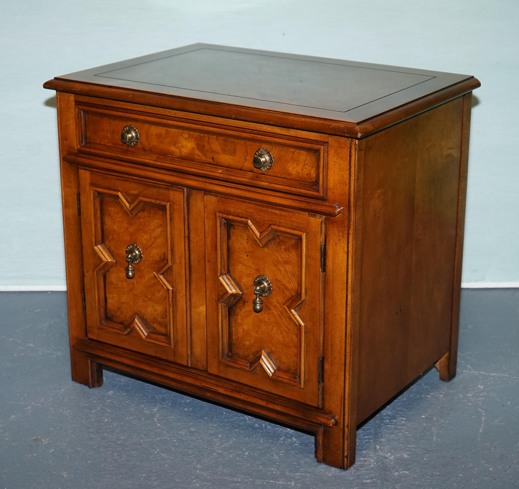 
Antiques of London



A refined Baker Furniture bedside cabinet, rendered in beautifully figured walnut and elegant architectural doors. This sophisticated piece features a single top drawer and cabinet doors with geometric carved panels—resting on
