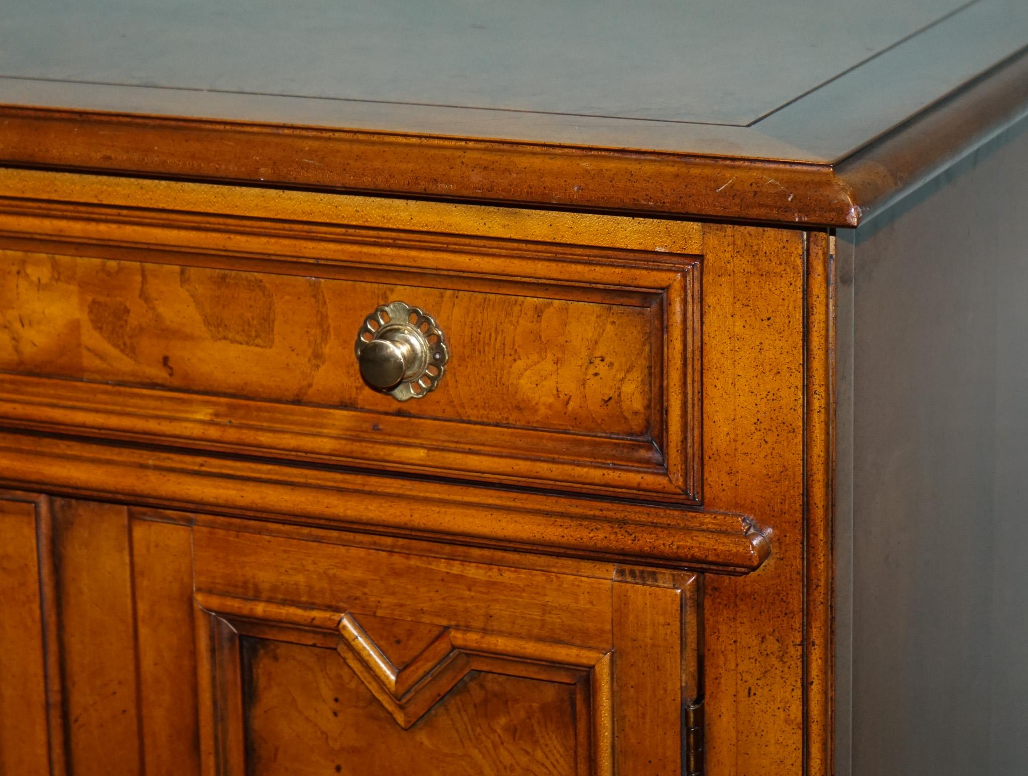 Walnut BAKER FURNITURE BURR WALNUT BEDSIDE CABiNET WITH DRAWER AND CARVED DOORS For Sale