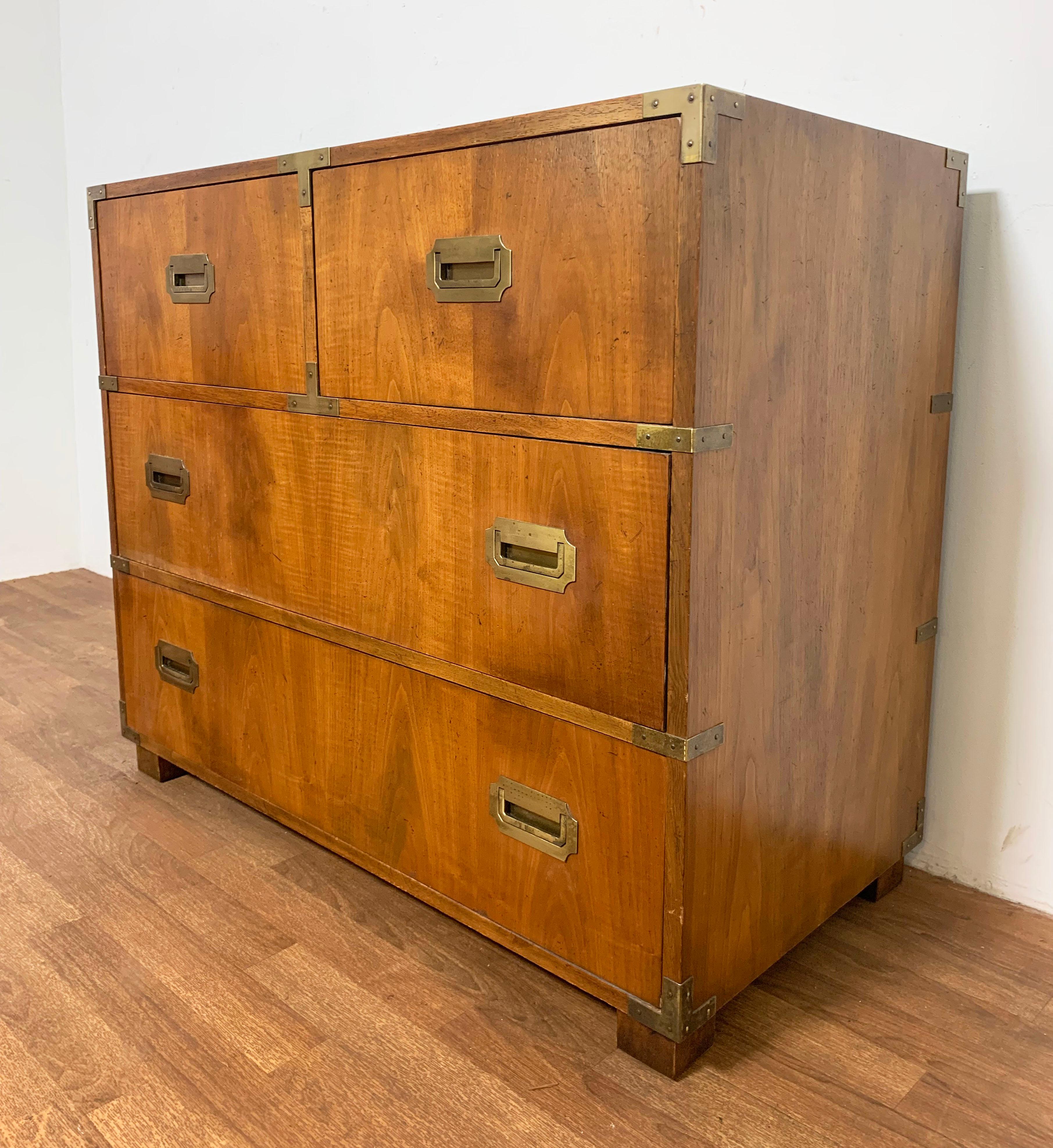 British Campaign style chest of four drawers with flush mount hardware in bleached Honduran mahogany by Baker Furniture, ca. 1950s.