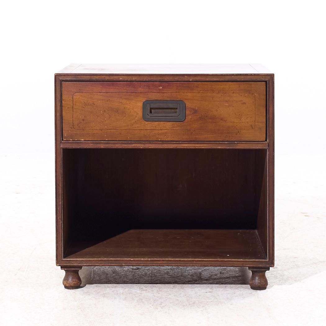 Baker Furniture Campaign Walnut Nightstand

This nightstand measures: 22 wide x 19 deep x 22 inches high

We take our photos in a controlled lighting studio to show as much detail as possible. We do not Photoshop out blemishes.

CONDITION: This item