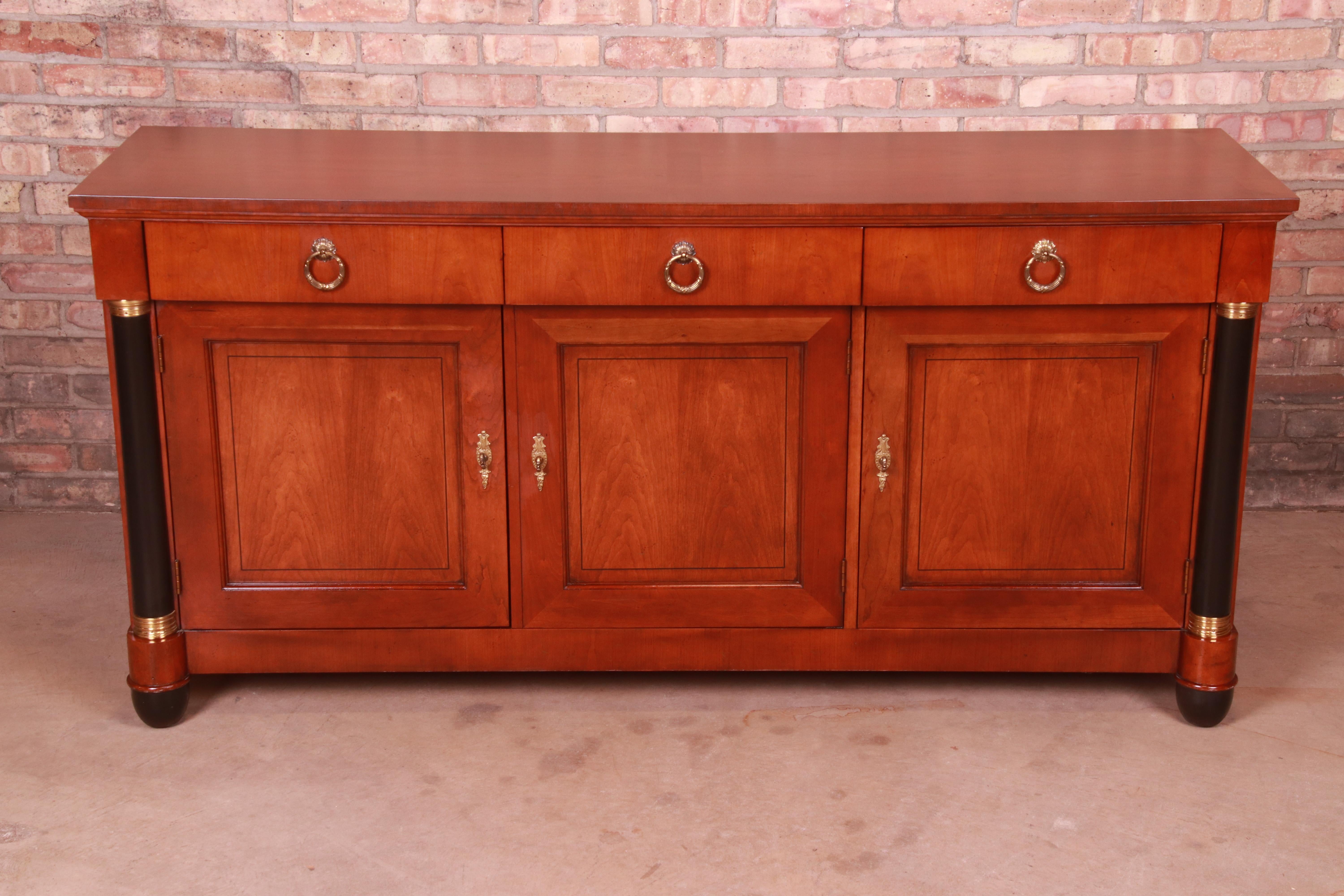 An exceptional neoclassical sideboard, credenza, or bar cabinet

By Baker Furniture 