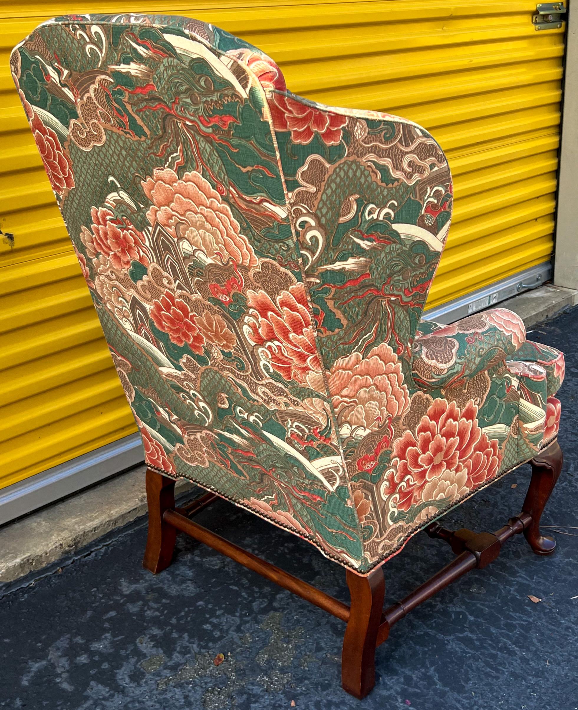 This is a lovely pair of Baker Furniture Chinese Chippendale style wingback chairs. The linen chinoiserie print is in very nice condition with no holes or rips. I would describe it as slightly faded but not in an unappealing way. They are marked.
