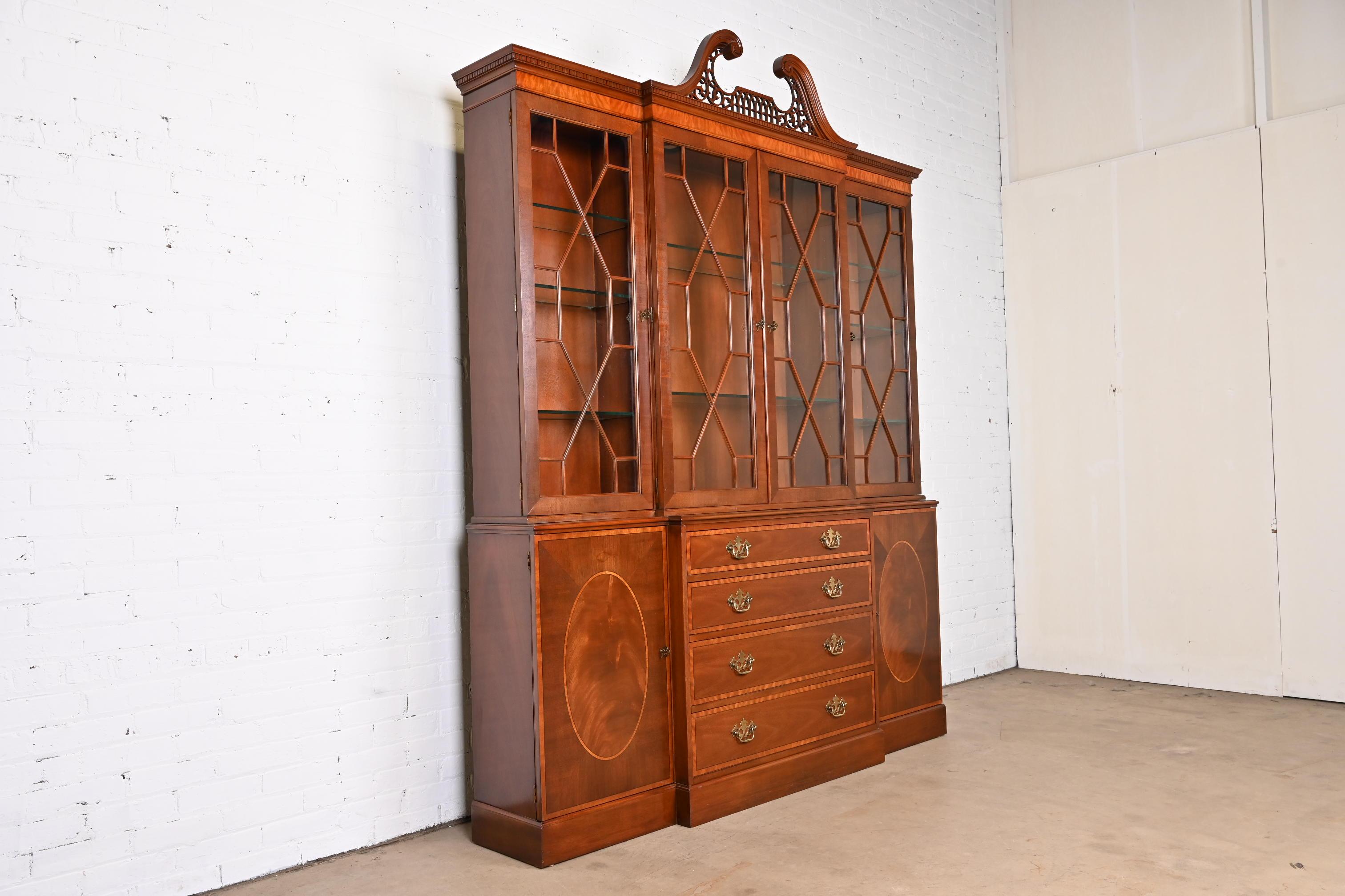 20th Century Baker Furniture Chippendale Banded Mahogany Lighted Breakfront Bookcase Cabinet