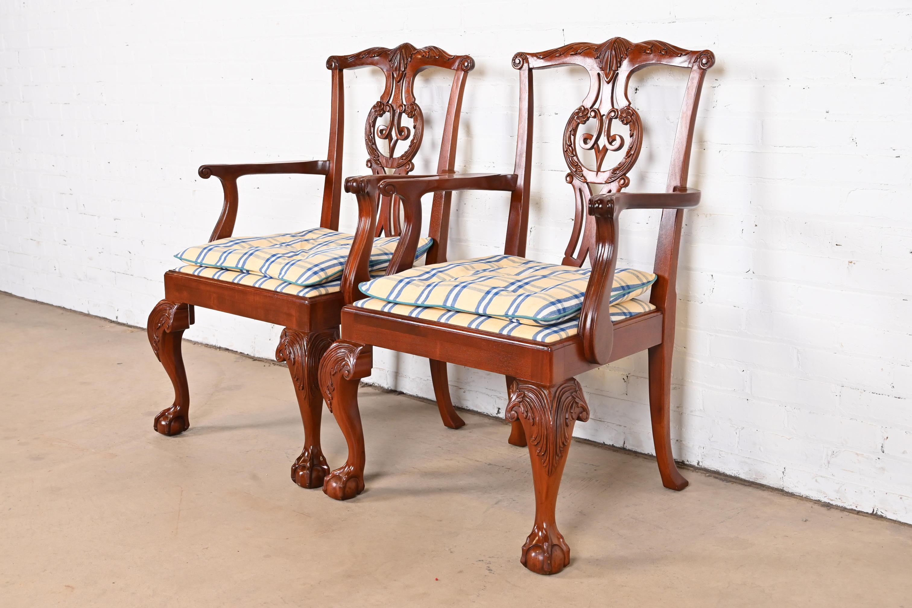 An outstanding pair of Chippendale or Georgian style armchairs

By Baker Furniture

USA, circa 1980s

Carved solid mahogany frames, with cabriole legs and ball and claw feet, and Ralph Lauren style plaid upholstery.

Measures: 25.75