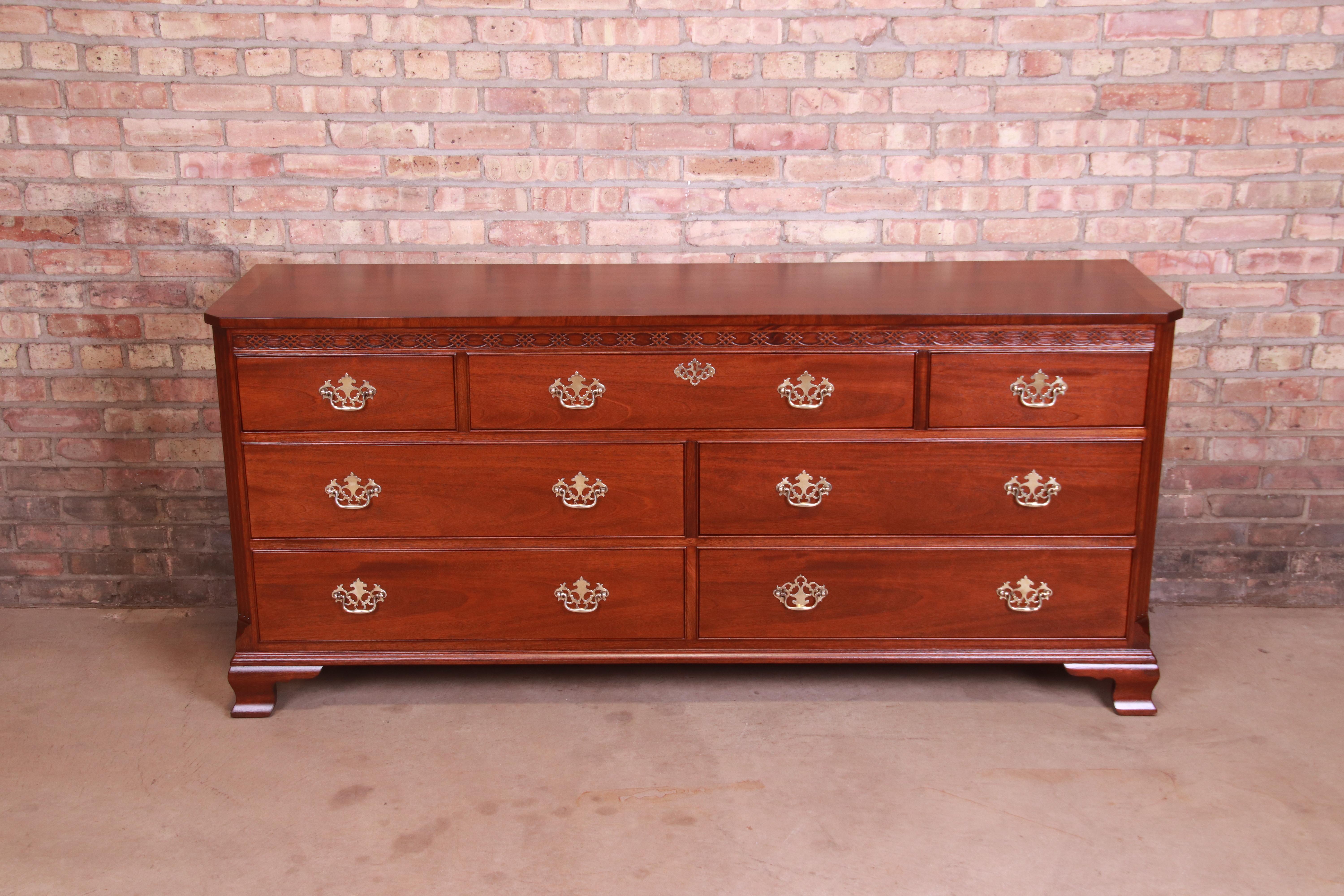 An exceptional Chippendale style long dresser or credenza

By Baker Furniture

USA, Circa 1980s

Carved mahogany, with original brass hardware.

Measures: 72