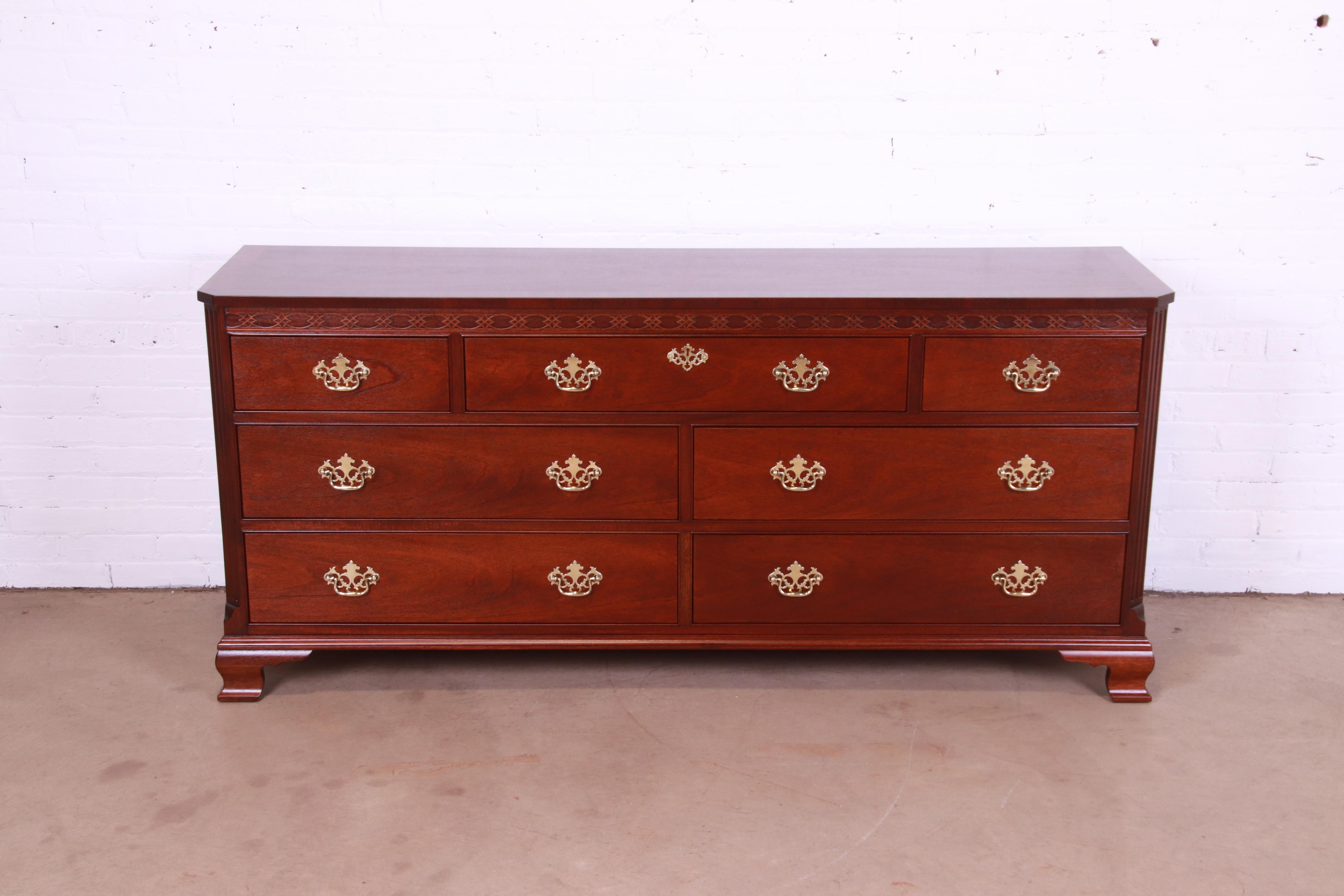 An exceptional Georgian or Chippendale style long dresser or credenza

By Baker Furniture

USA, Circa 1980s

Carved mahogany, with original brass hardware.

Measures: 72