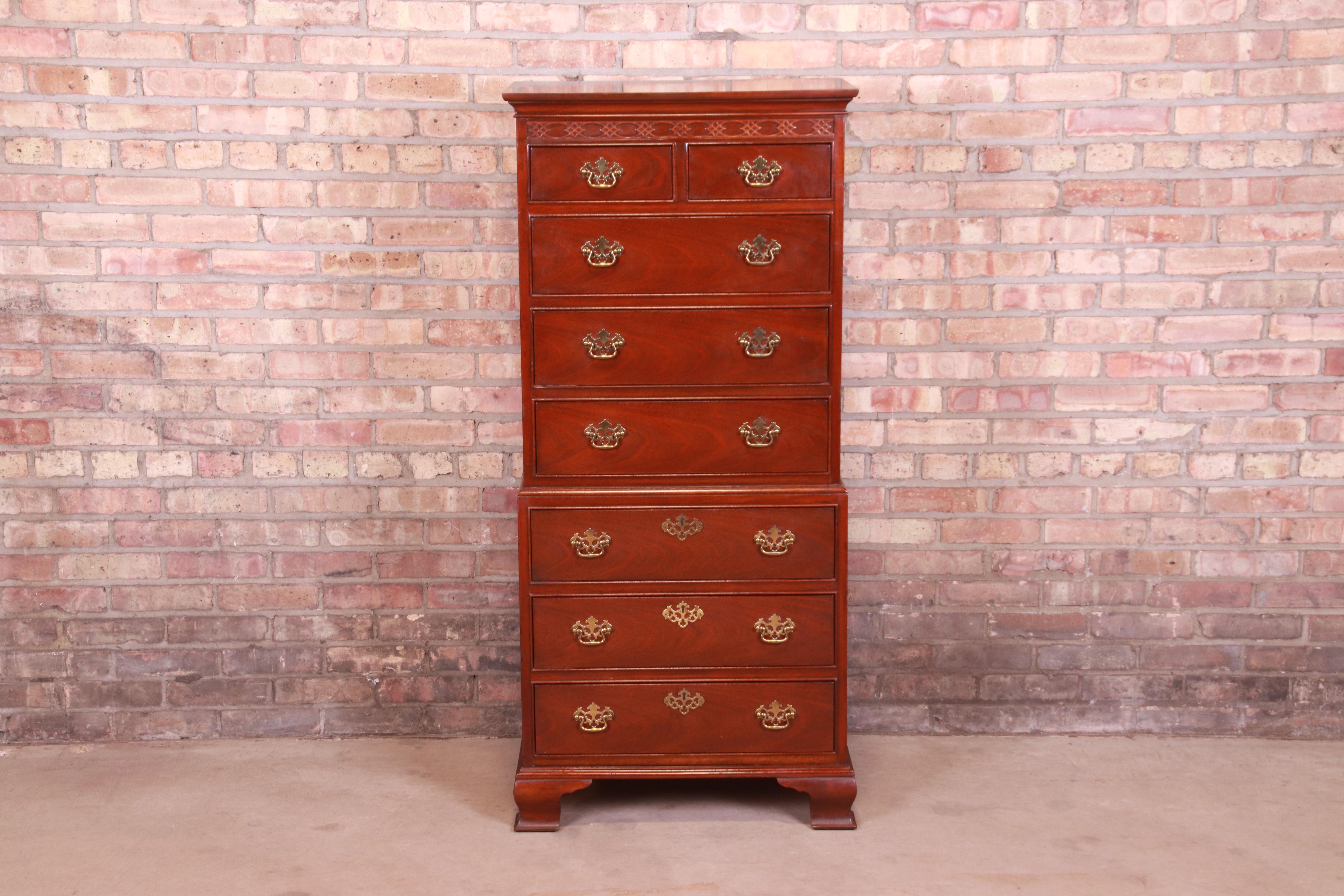 A gorgeous Chippendale style eight-drawer highboy dresser or lingerie chest of drawers

By Baker Furniture

USA, Circa 1980s

Carved mahogany, with original brass hardware.

Measures: 25.38
