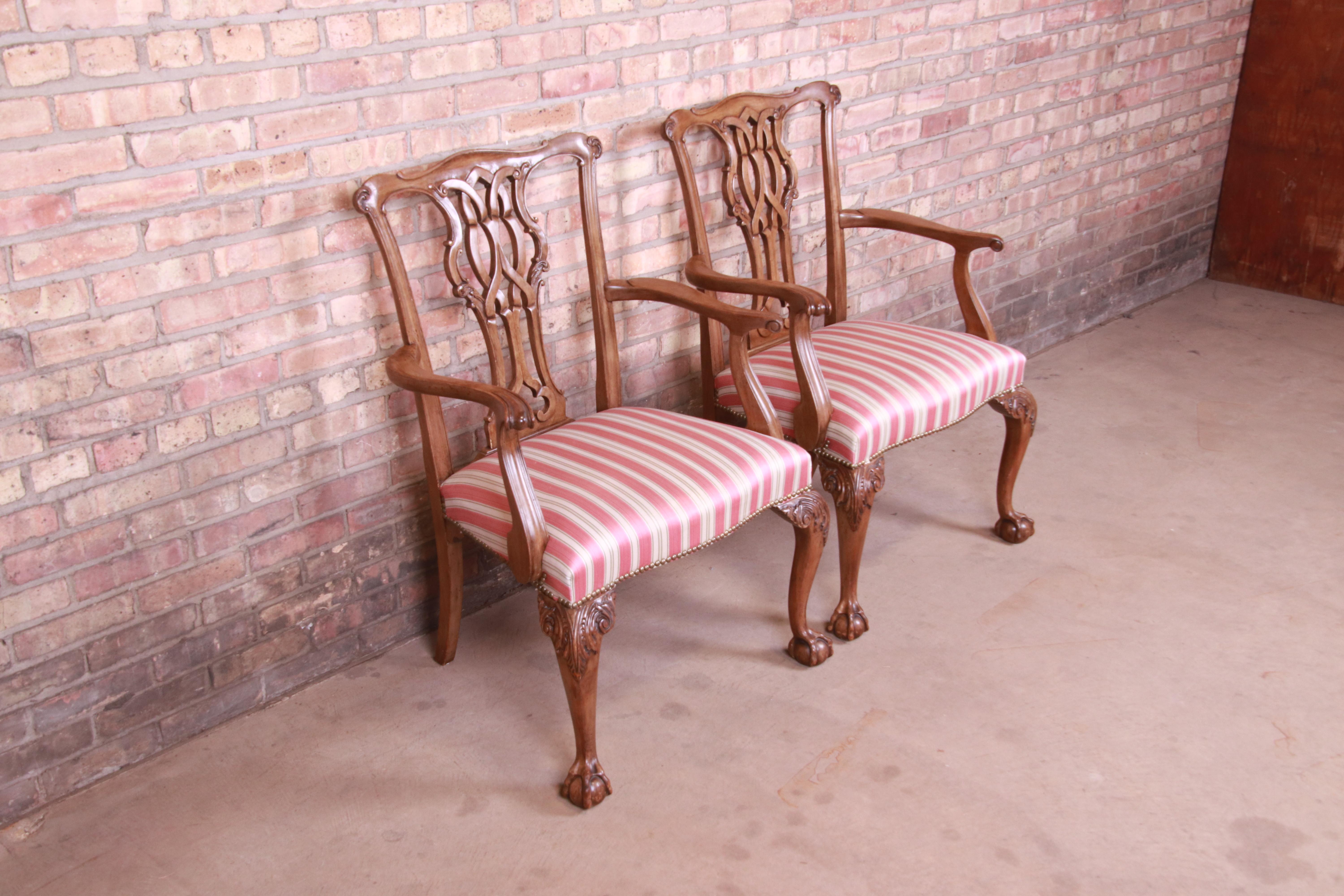 20th Century Baker Furniture Chippendale Carved Walnut Armchairs, Pair