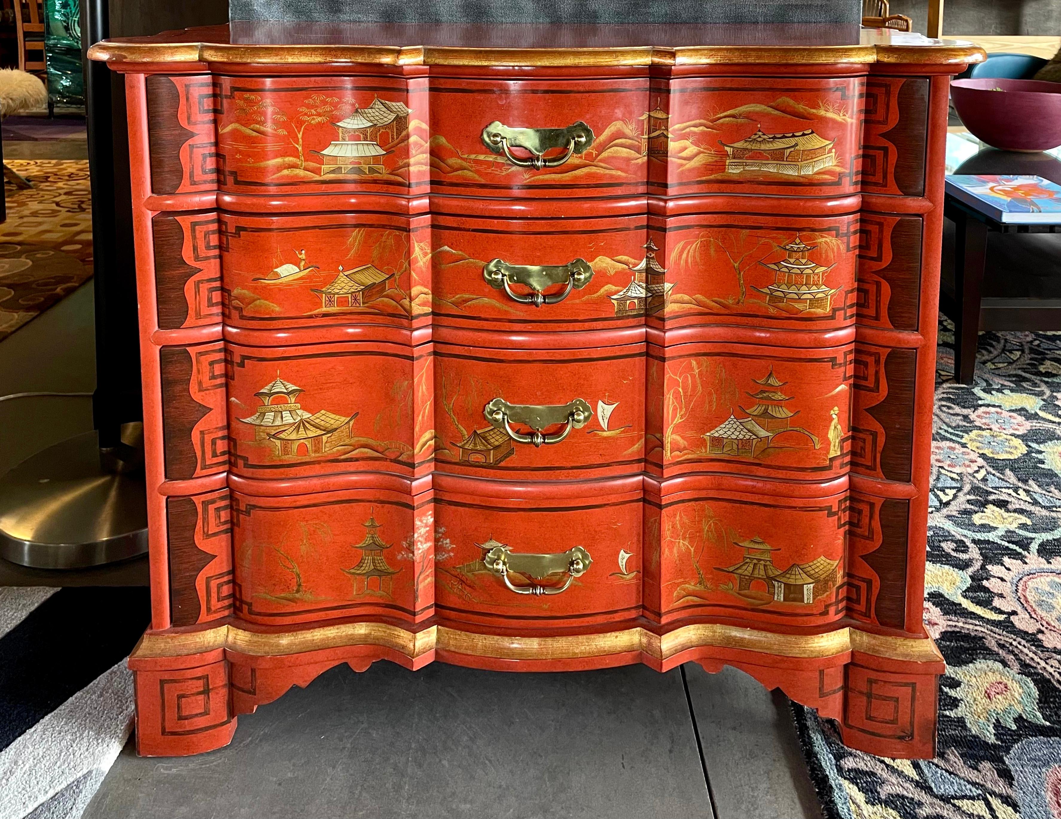 Baker Furniture cinnabar red lacquer hand-painted dutch chest of drawers, USA. Vintage Collector’s Edition rarity. Labelled. Lovely piece. Post 1970, USA. Vibrant red cinnabar hue is as fresh as it is classic. The current iteration of the Baker