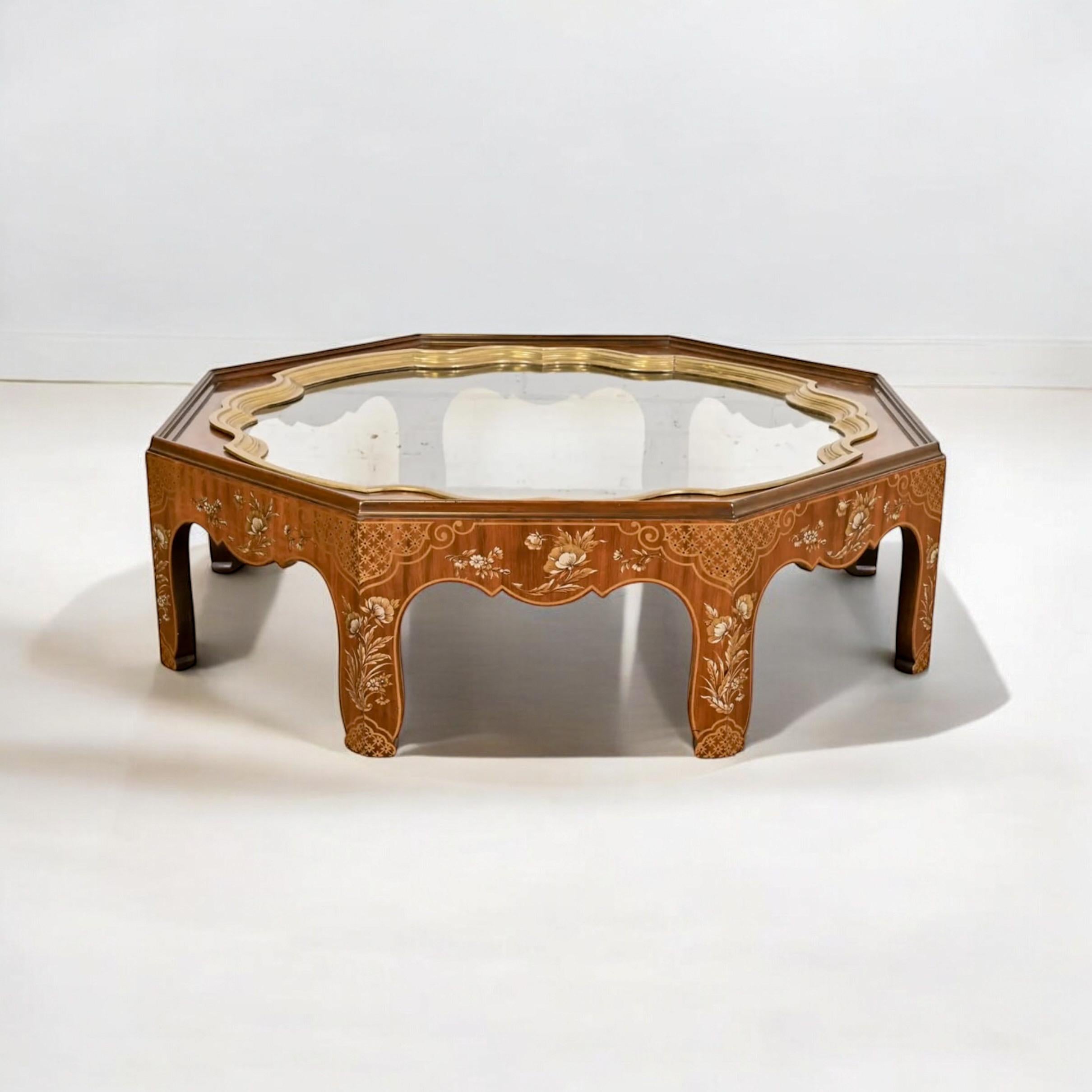 This is a Baker Furniture Collector’s Edition tray top coffee table with burl walnut. The tray is removable, and the surface around the tray is burl. The sides have the painted chinoiserie scenes. It is marked. 

Shipping is running two to five