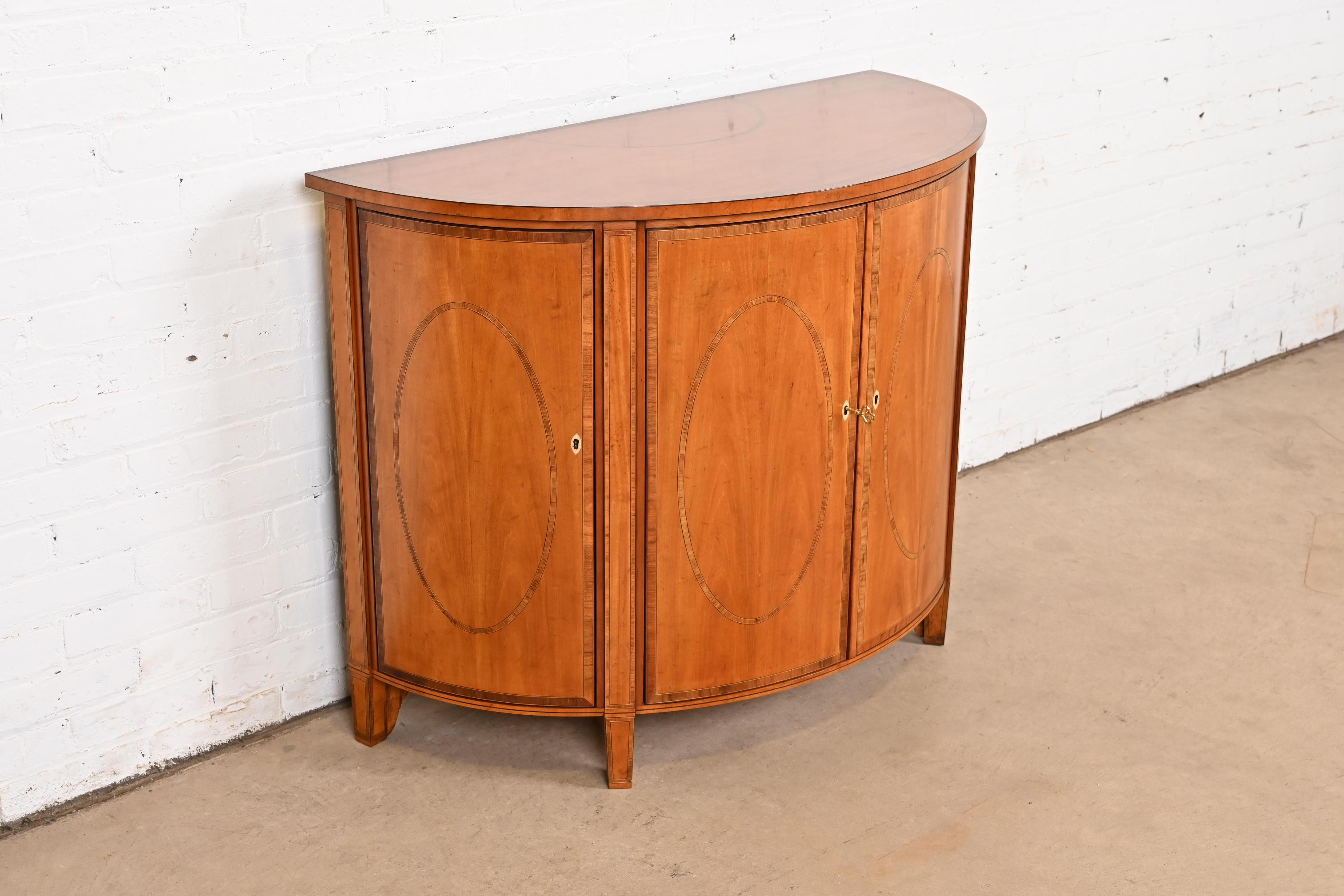 Late 20th Century Baker Furniture Colonial Williamsburg Federal Inlaid Fruitwood Demilune Cabinet For Sale