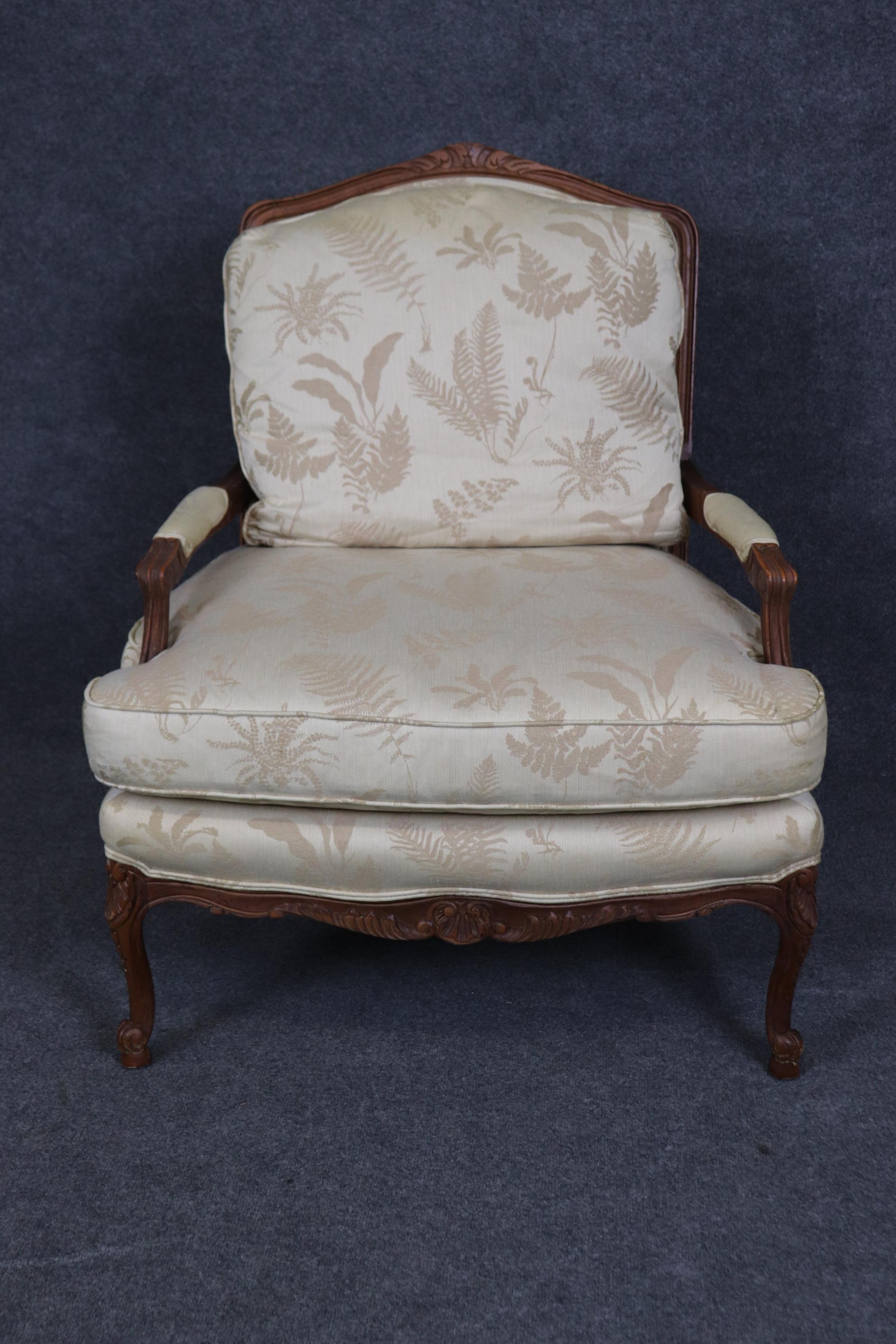 Late 20th Century Baker Furniture Company Carved Walnut French Louis XV Style Arm Chair  & Ottoman For Sale