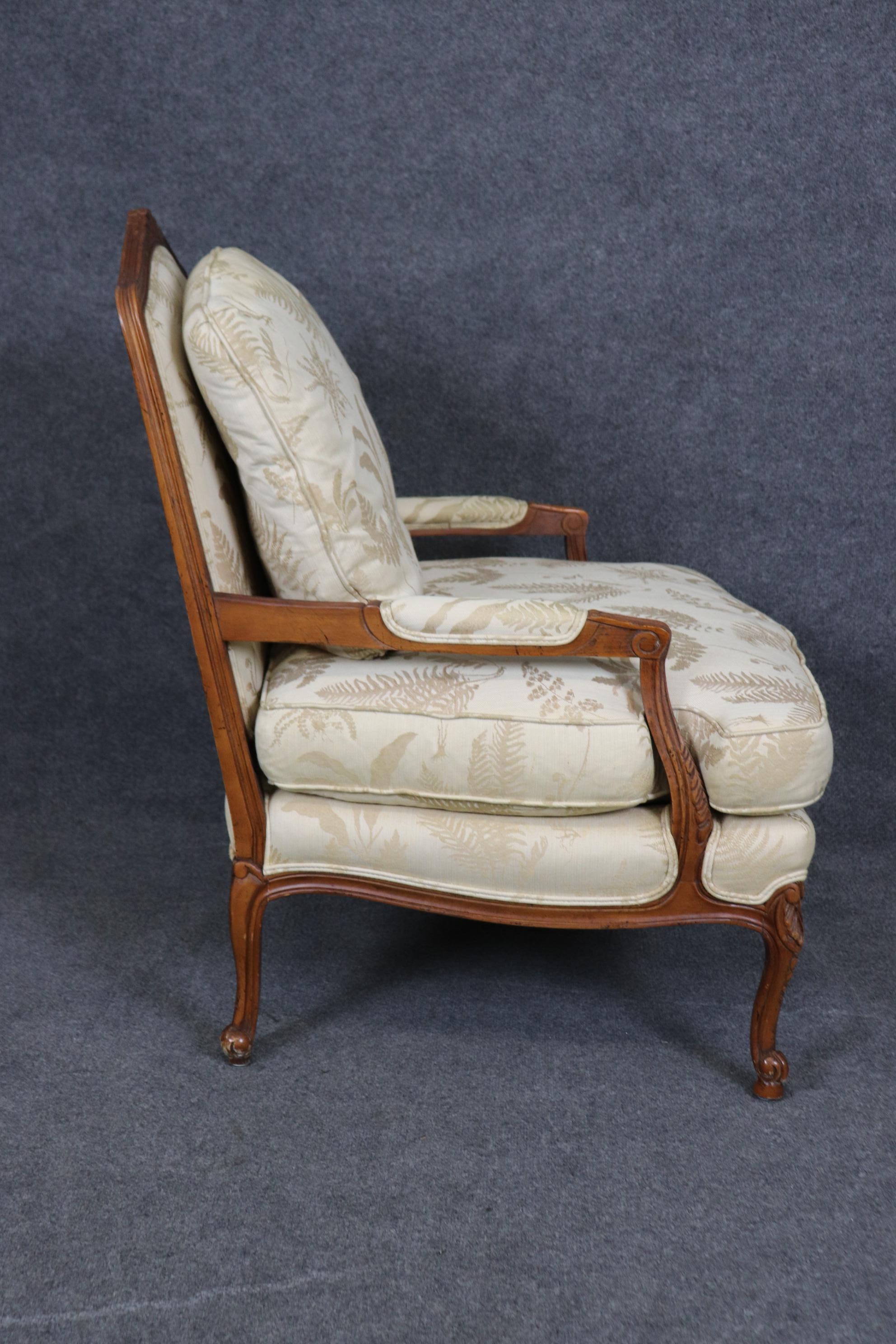 Baker Furniture Company Carved Walnut French Louis XV Style Arm Chair  & Ottoman For Sale 3