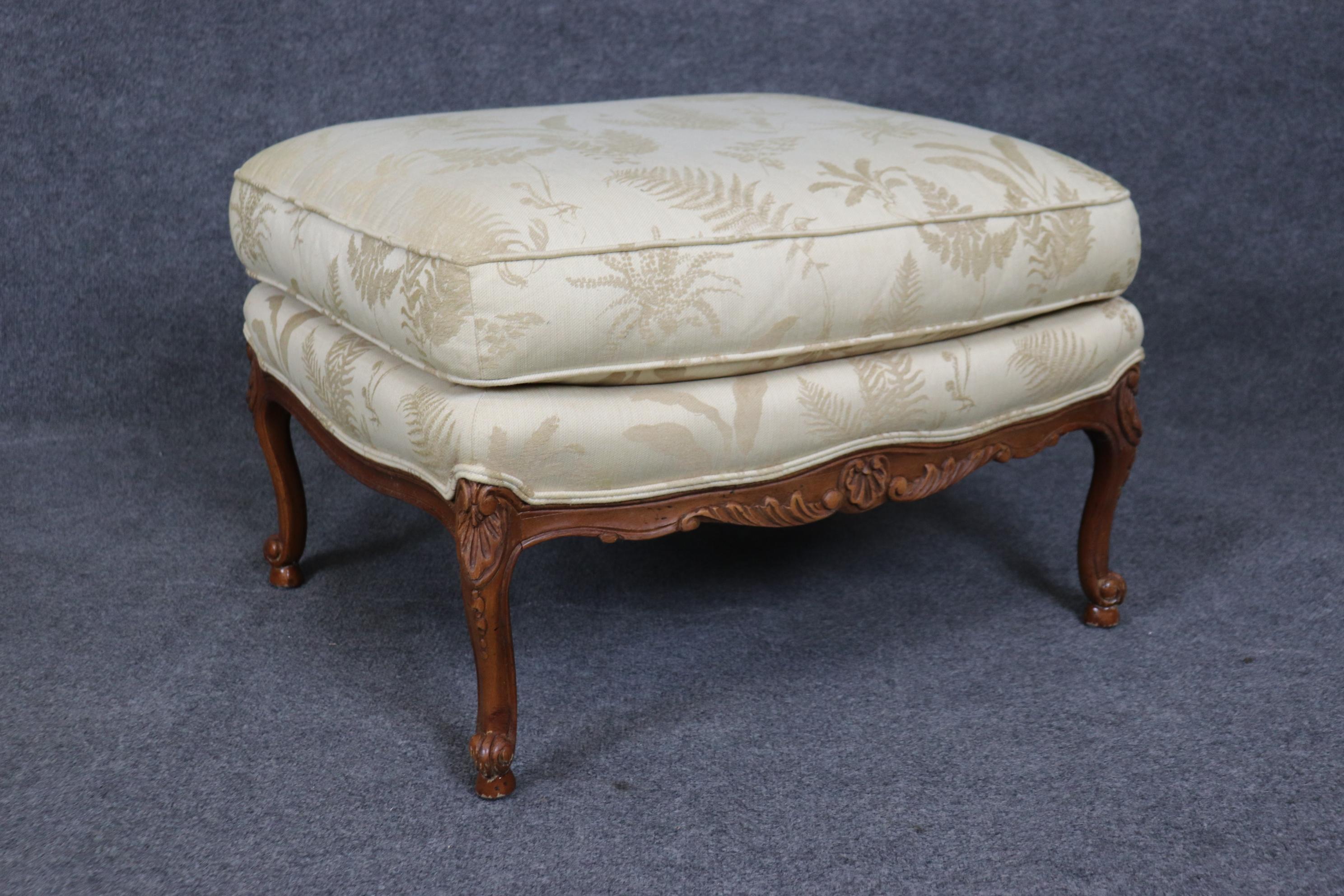 Baker Furniture Company Carved Walnut French Louis XV Style Arm Chair  & Ottoman For Sale 4