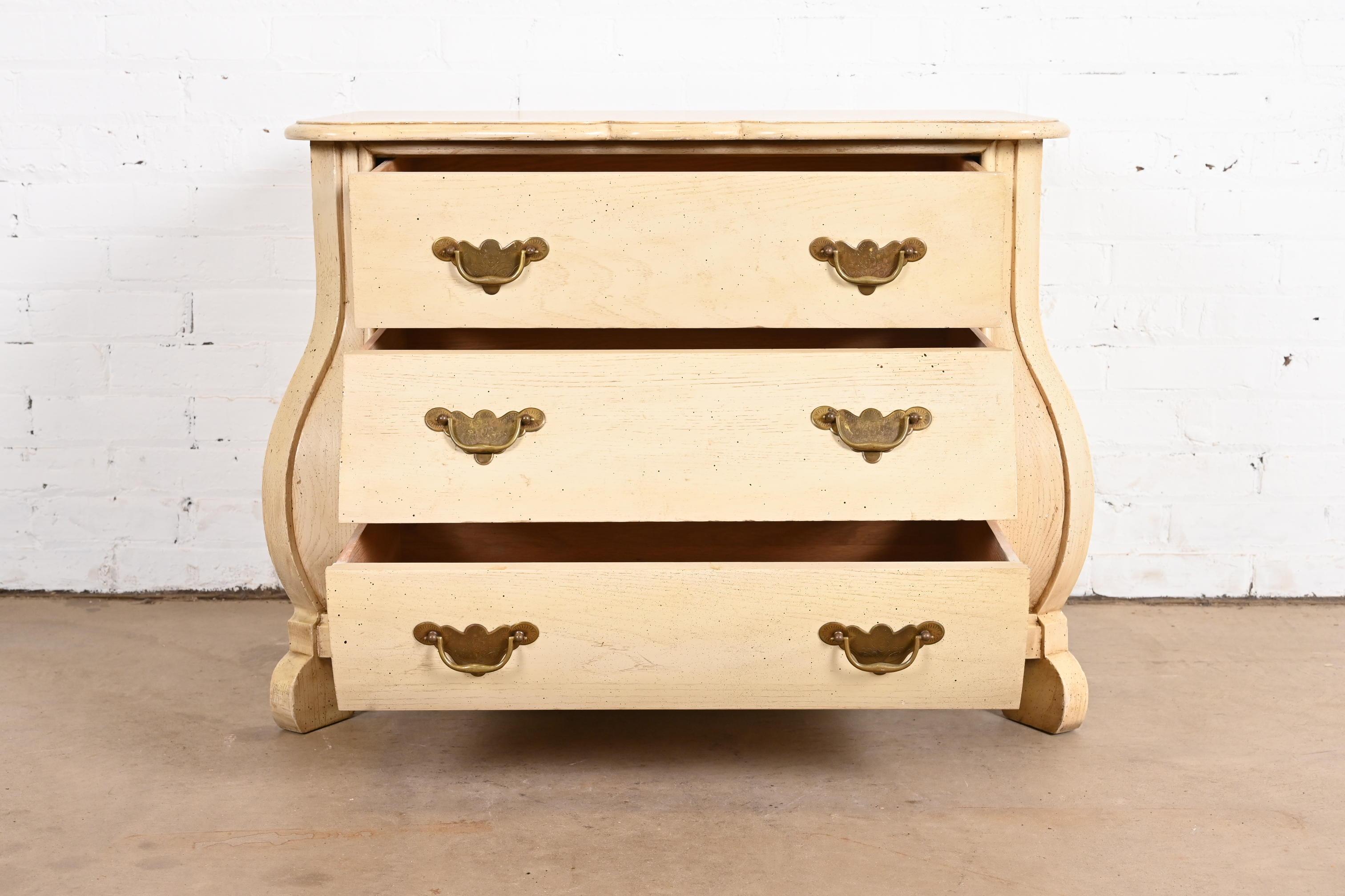 Mid-20th Century Baker Furniture Dutch Cream Painted Oak Bombe Chest or Commode For Sale