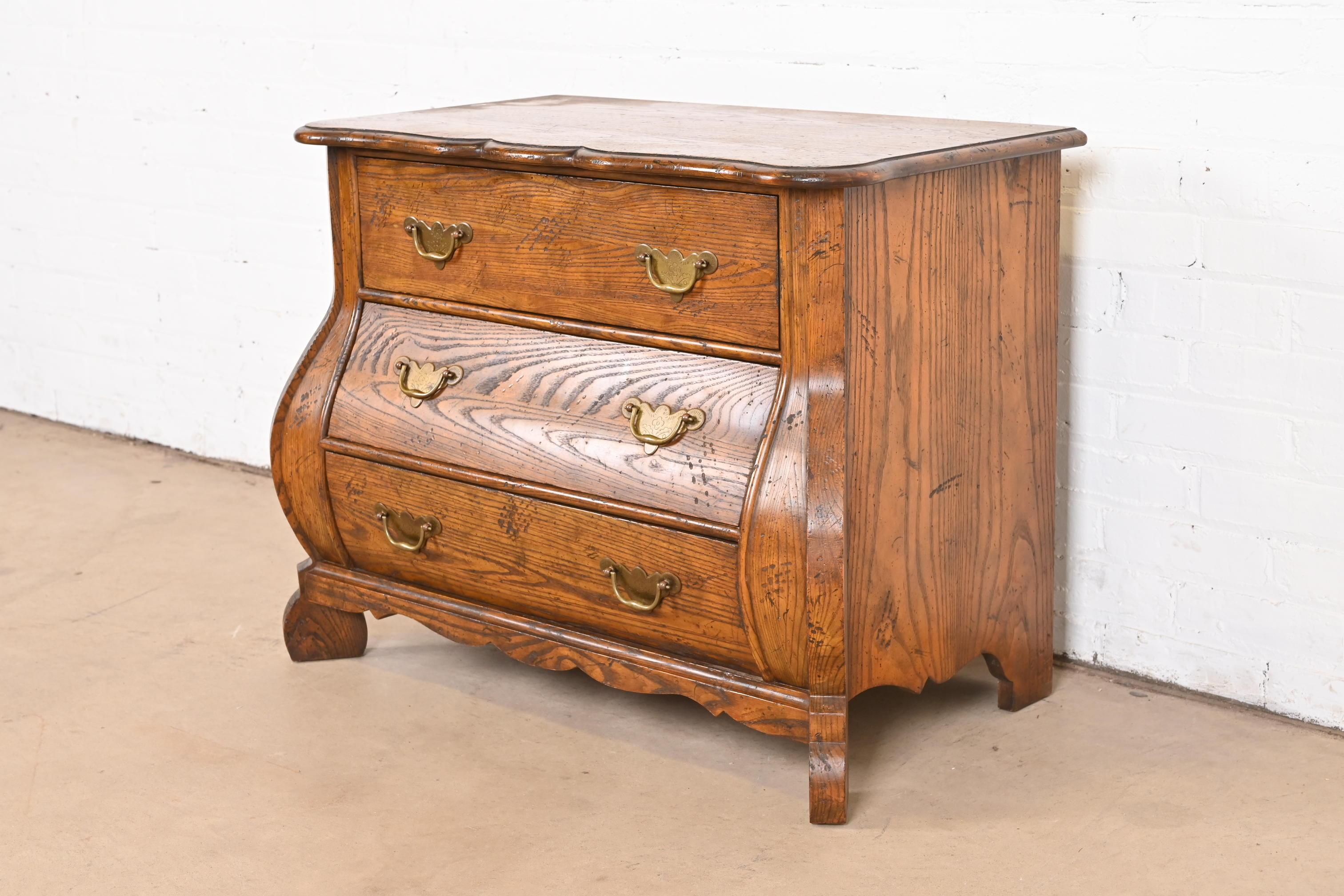 Dutch Colonial Baker Furniture Dutch Oak Bombe Chest or Commode For Sale
