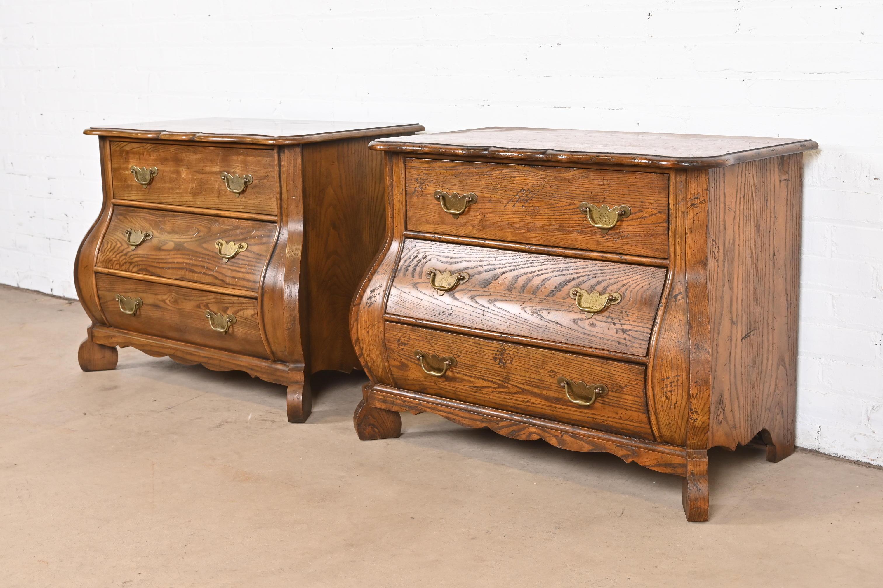 French Provincial Baker Furniture Dutch Oak Bombe Chests or Commodes, Pair
