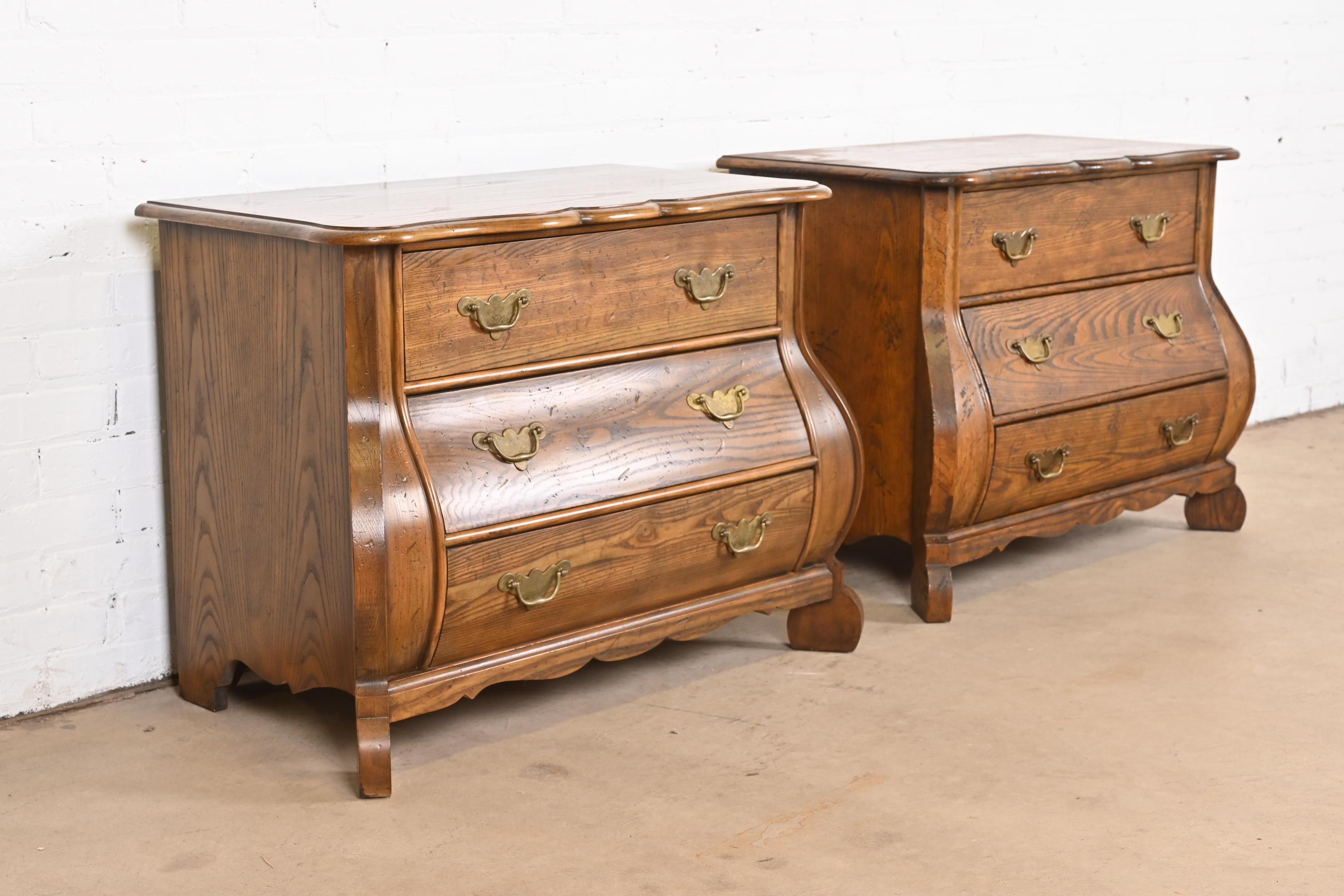 Baker Furniture Dutch Oak Bombe Chests or Commodes, Pair In Good Condition In South Bend, IN