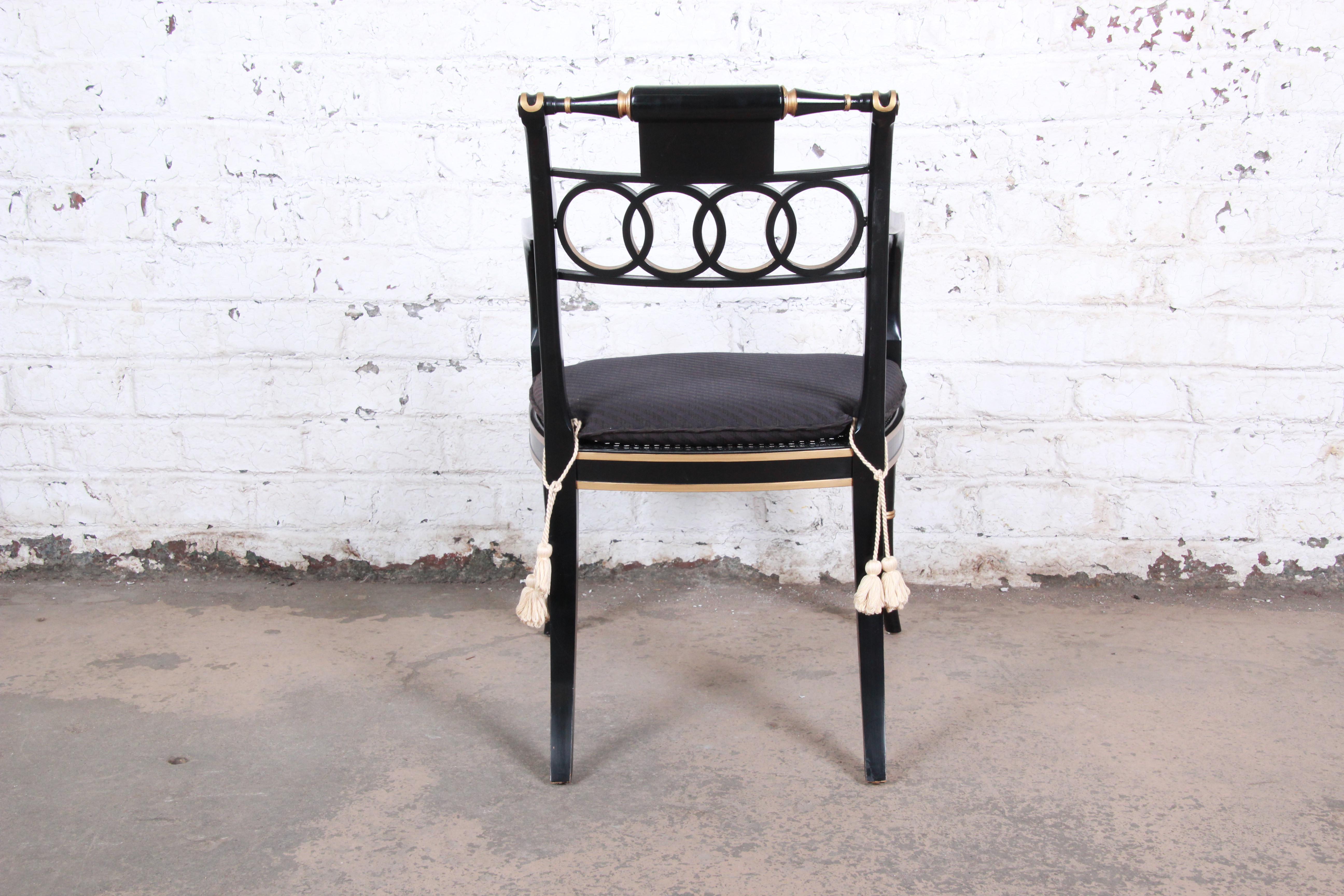 20th Century Baker Furniture Ebonized and Gold Gilt Regency Style Armchairs, Pair