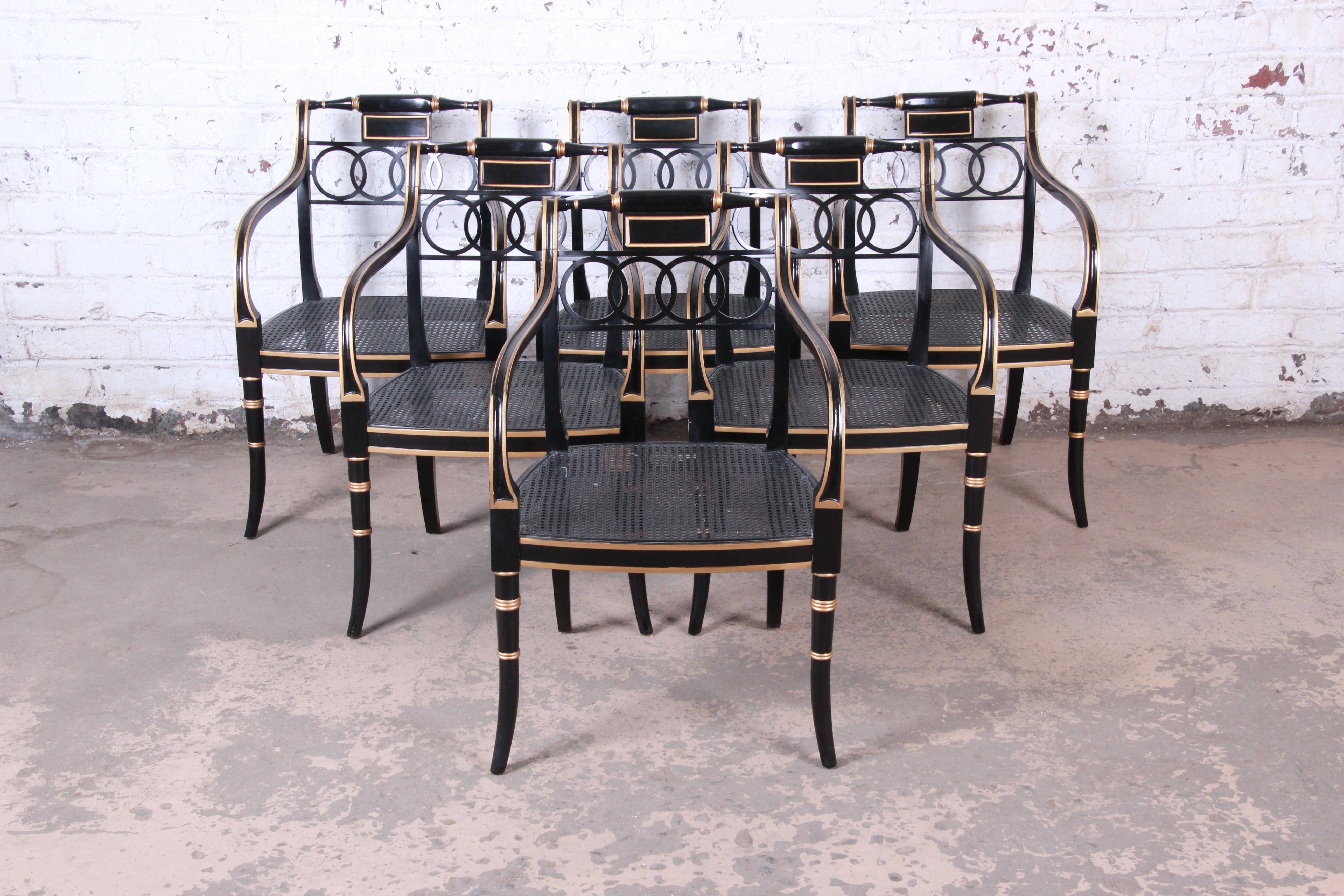Cane Baker Furniture Ebonized and Gold Gilt Regency Style Armchairs, Set of Six