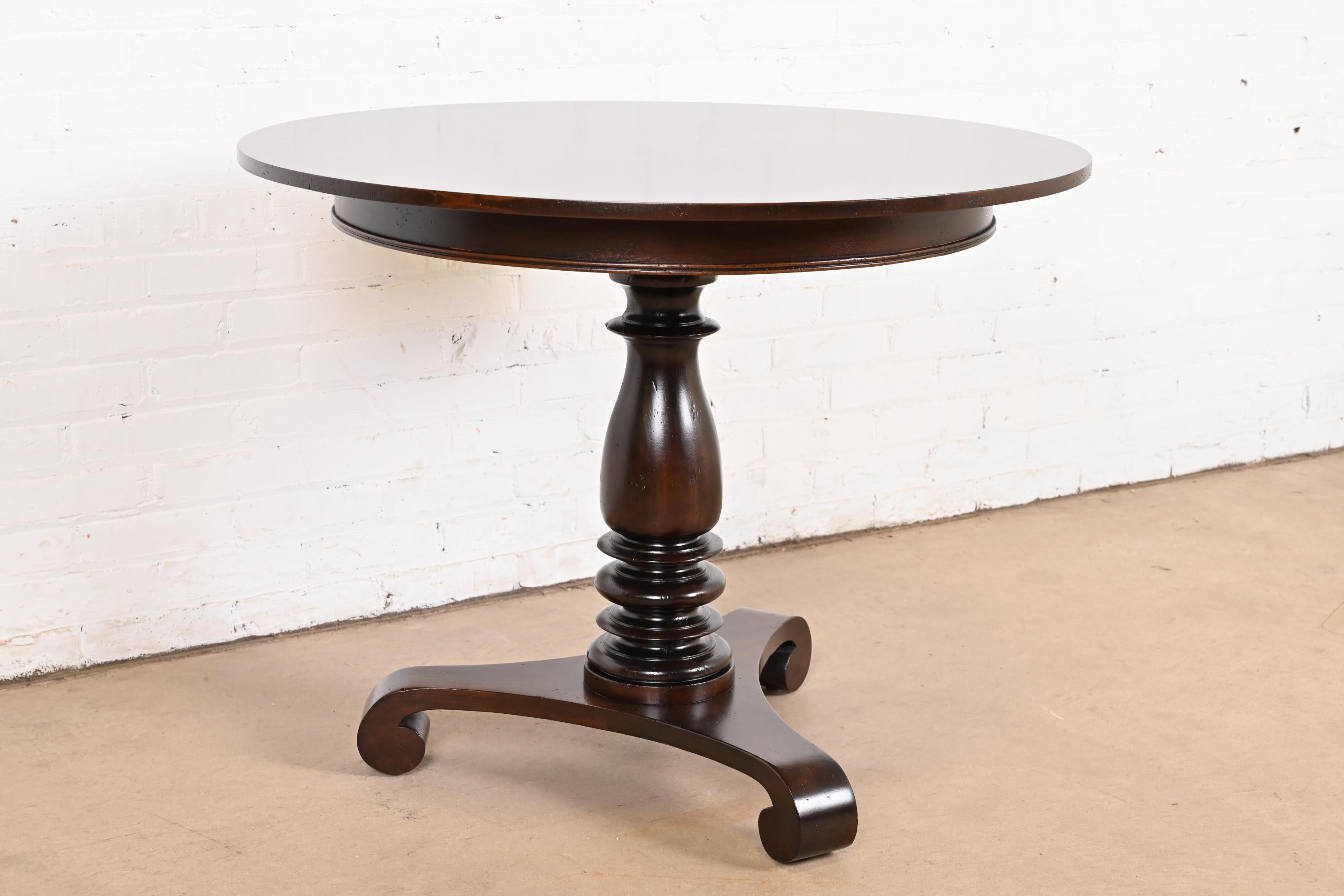 20th Century Baker Furniture Empire Carved Mahogany Pedestal Tea Table or Center Table