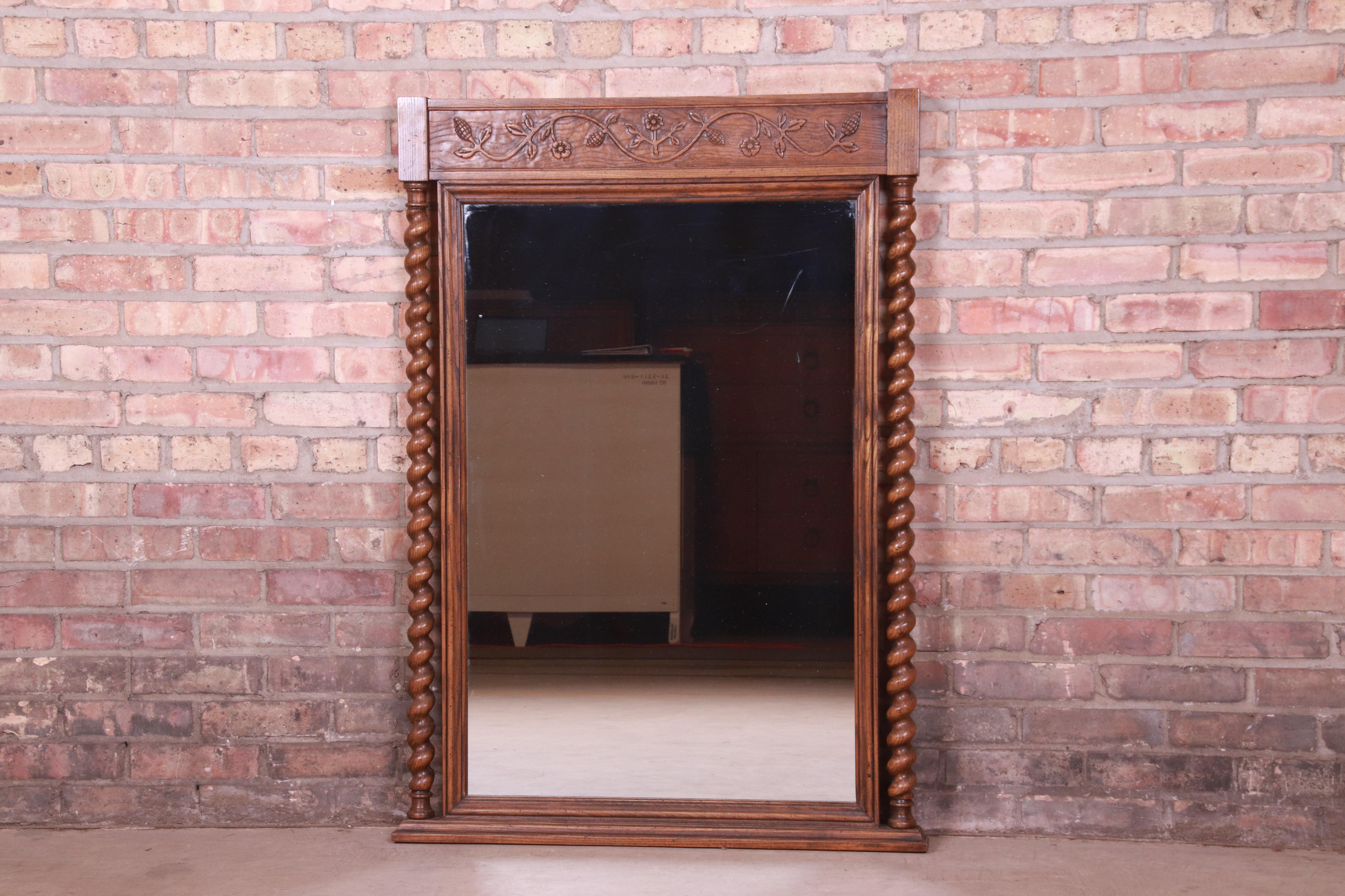 French Provincial Baker Furniture English Barley Twist Carved Oak Framed Wall Mirror, Circa 1960s For Sale