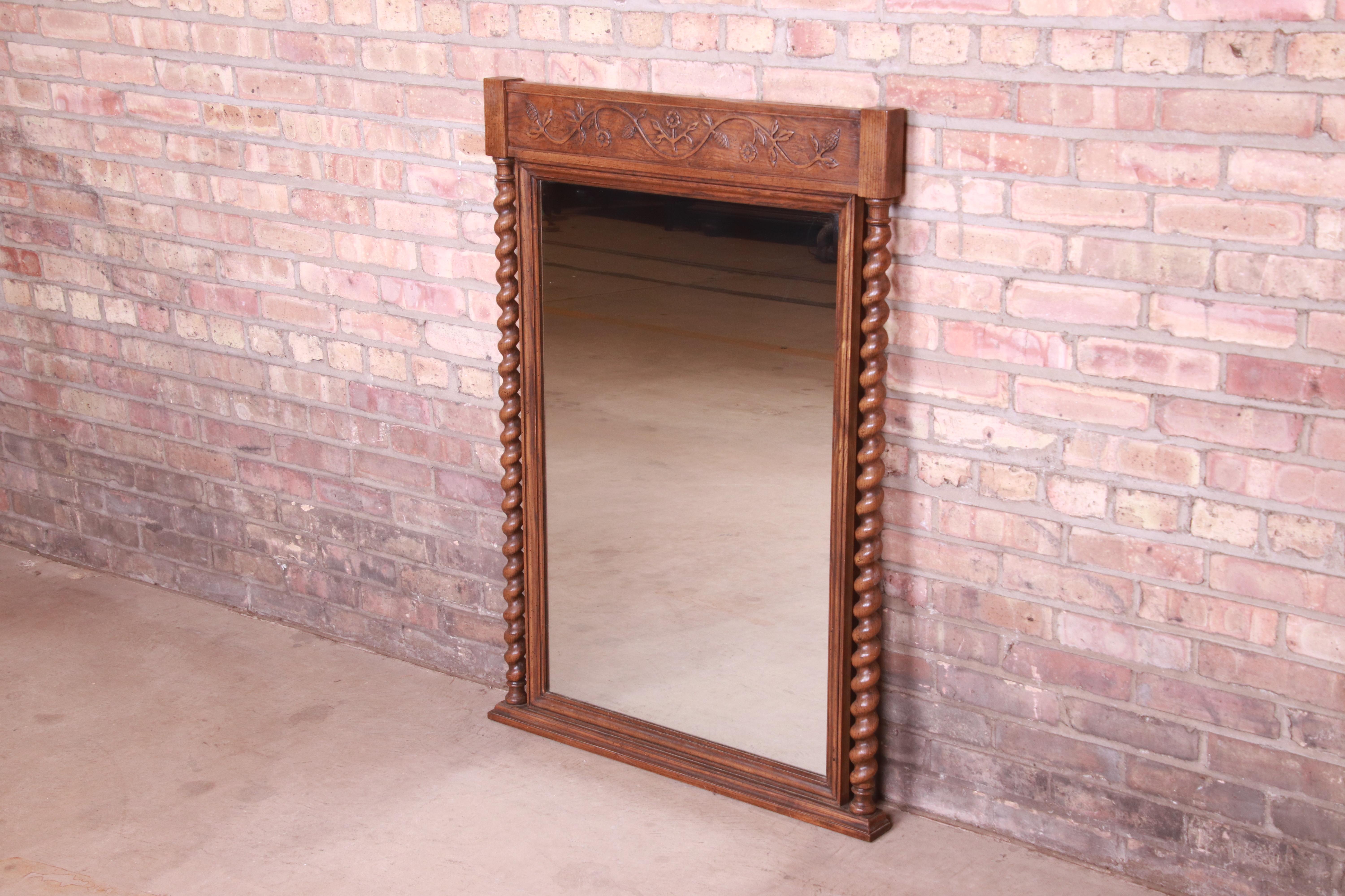 American Baker Furniture English Barley Twist Carved Oak Framed Wall Mirror, Circa 1960s For Sale