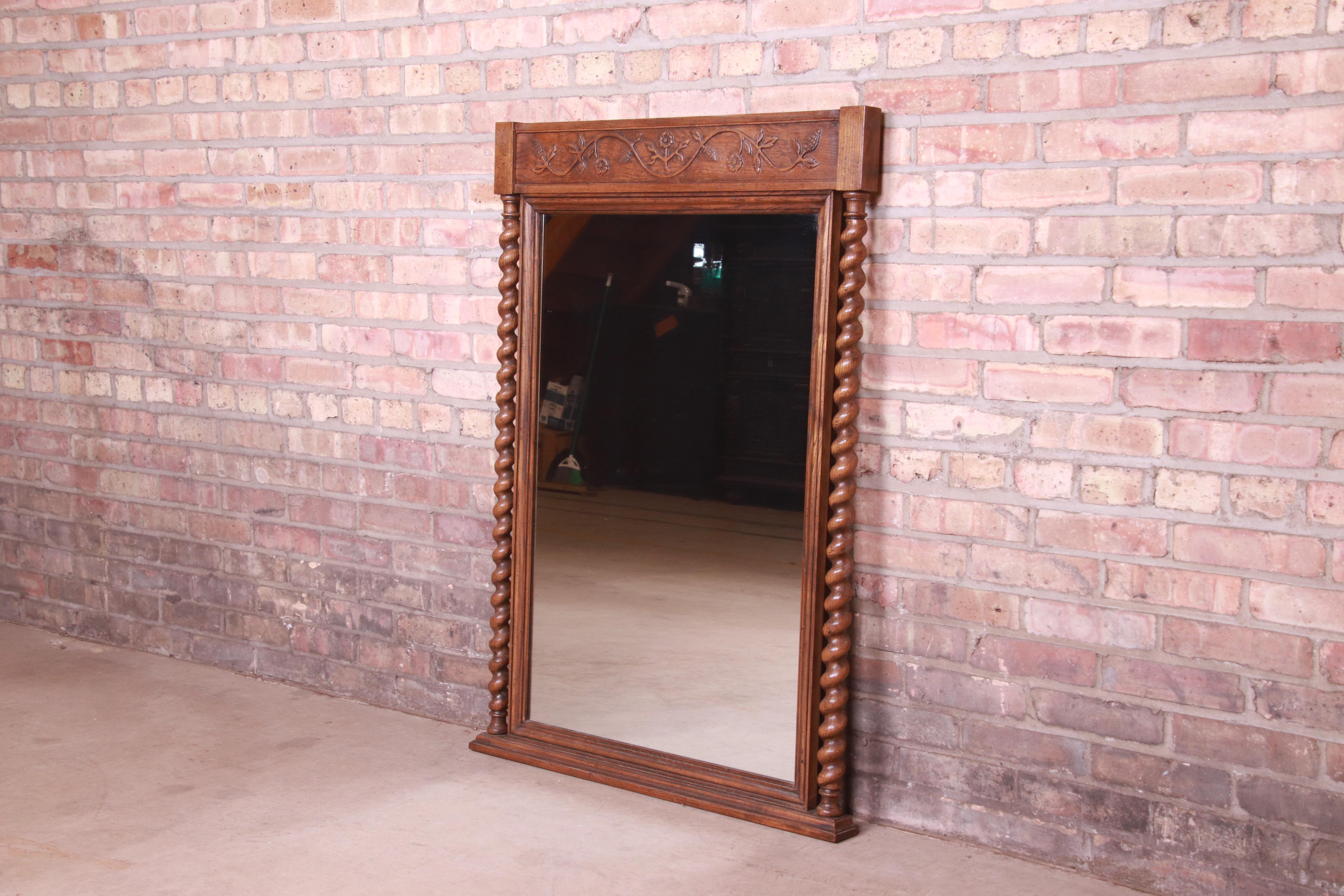 Baker Furniture English Barley Twist Carved Oak Framed Wall Mirror, Circa 1960s In Good Condition For Sale In South Bend, IN