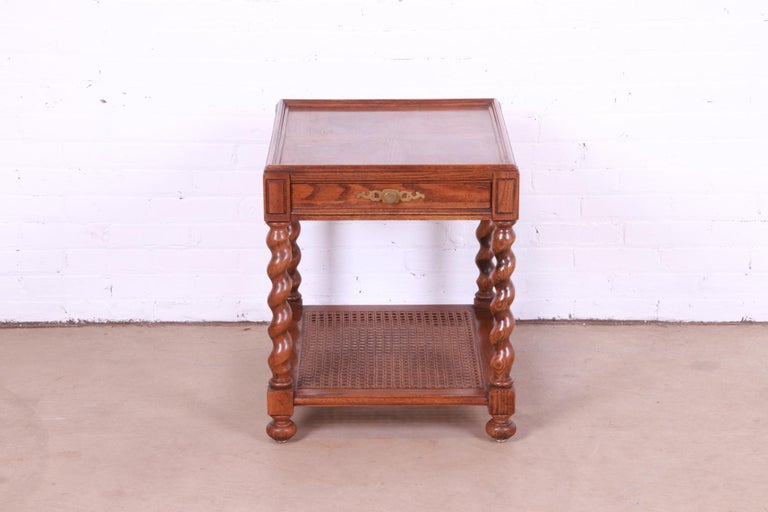 Jacobean Baker Furniture English Barley Twist Oak, Burl, and Cane Tea Table For Sale