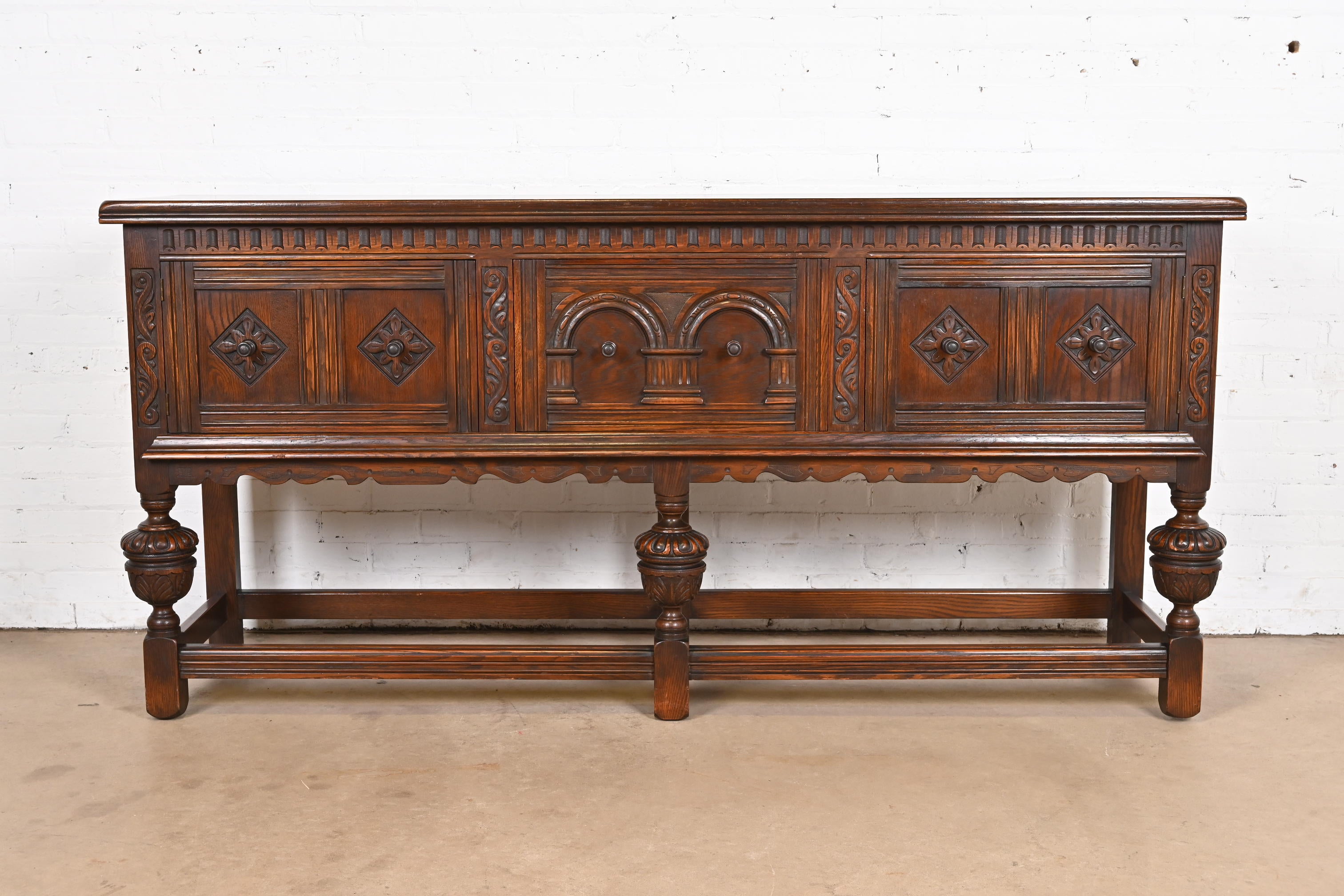 American Baker Furniture English Jacobean Ornate Carved Oak Sideboard or Credenza