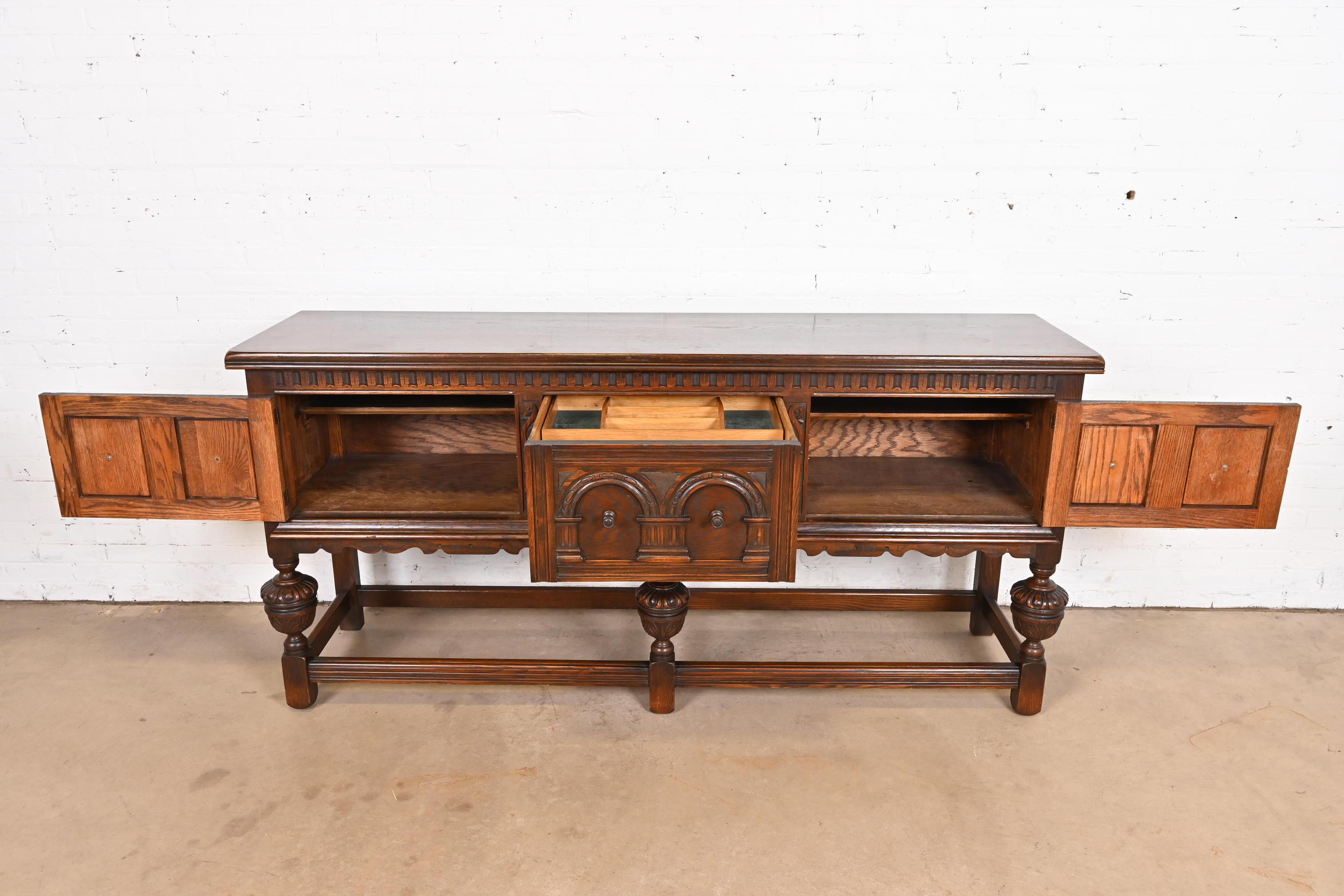 Baker Furniture English Jacobean Ornate Carved Oak Sideboard or Credenza 1