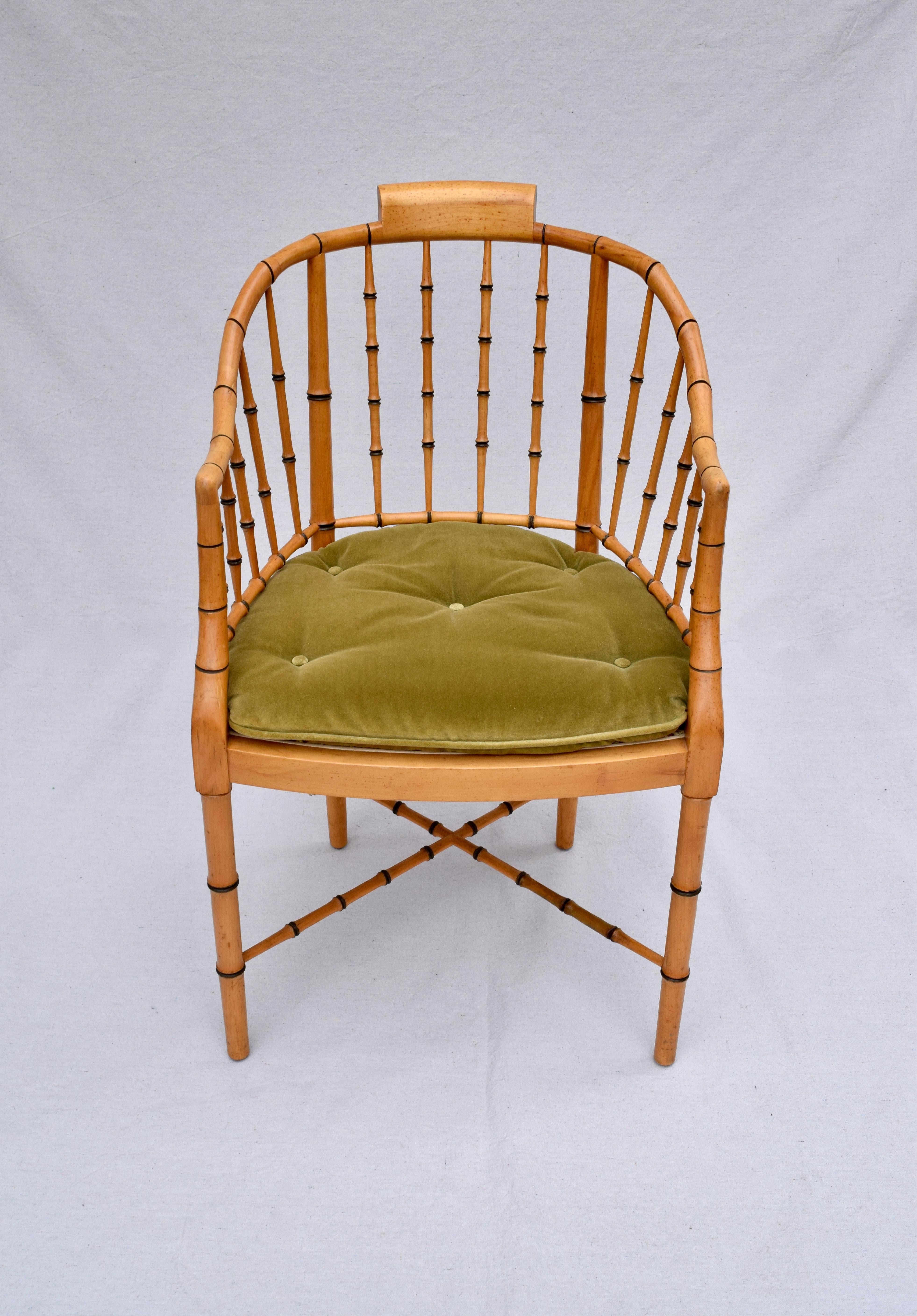 Faux bamboo Regency armchair with new caned seat by Baker Furniture USA, 1960s. Includes custom tufted green velvet cushion with tassel ties. Excellent vintage condition. Seat height 20