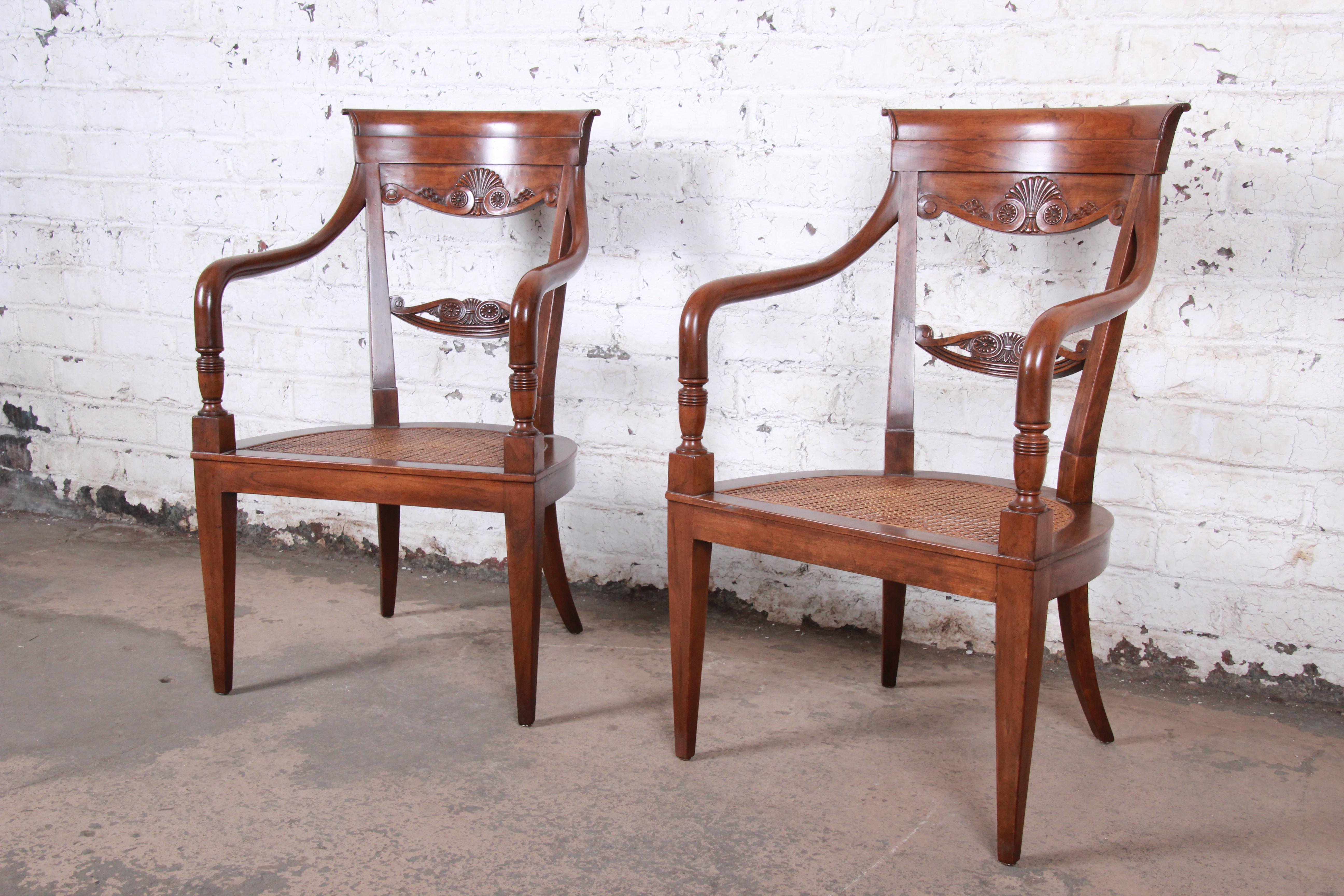 French carved walnut and cane armchairs

Made by Baker Furniture

USA, circa 1960s

Carved walnut + cane + velvet

Measures: 22.5