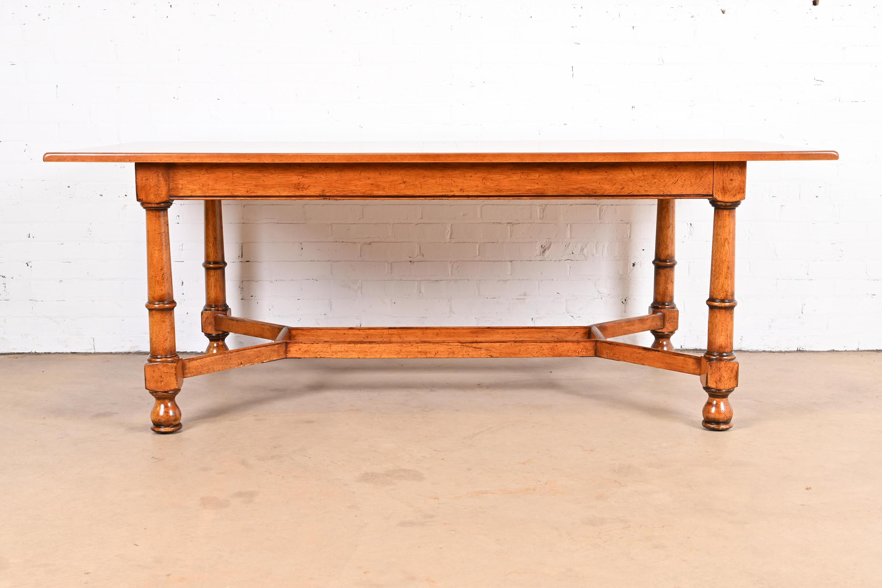 An exceptional French Country, French Provincial, or Rustic European style maple harvest dining table

By Baker Furniture, 