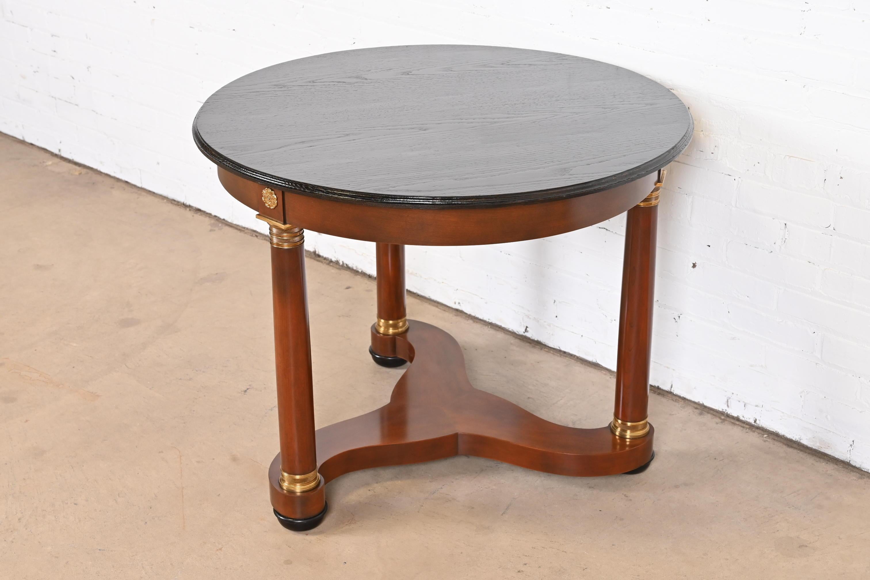Baker Furniture French Empire Cherry Wood, Brass, and Ebonized Center Table In Good Condition For Sale In South Bend, IN