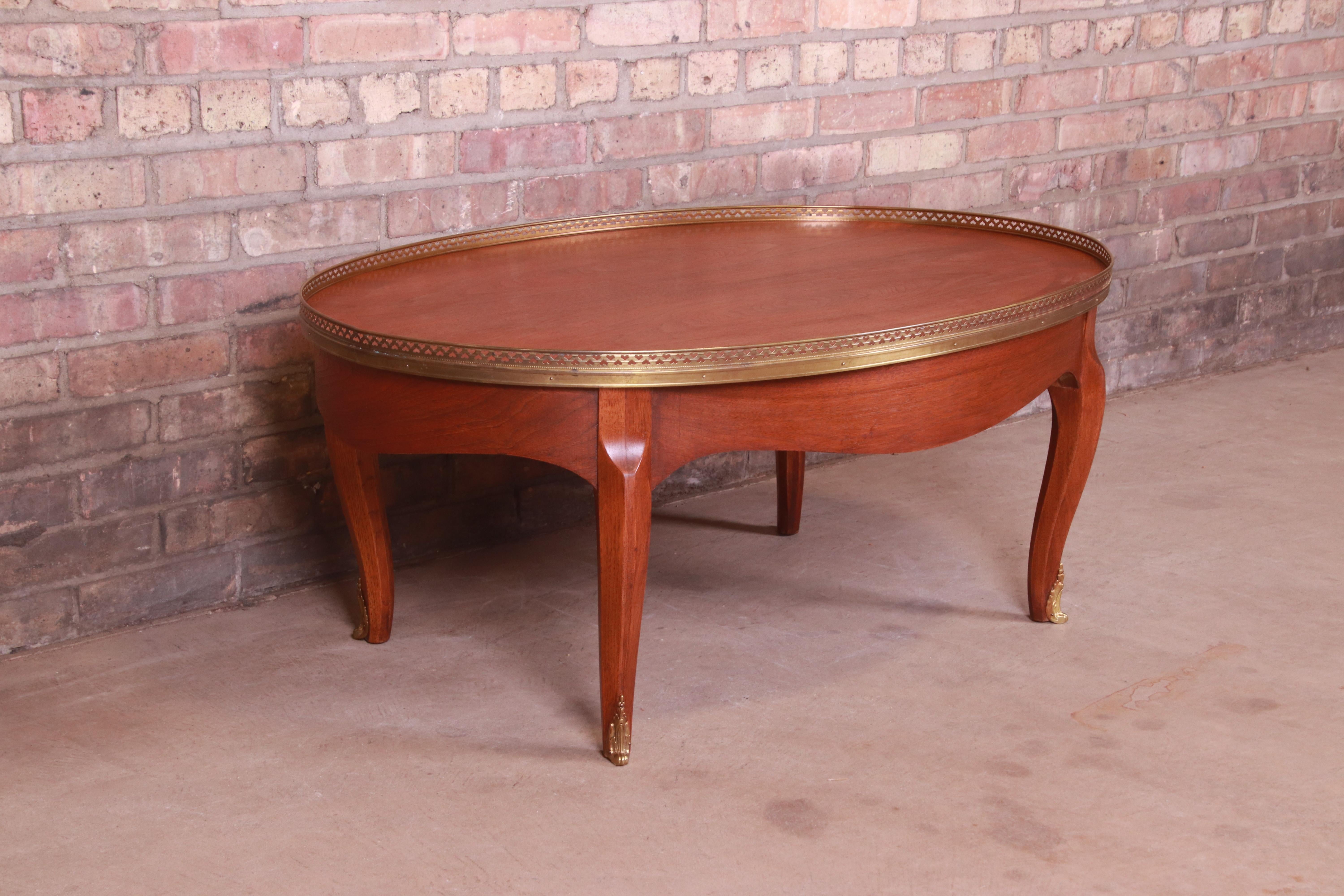 Baker Furniture French Louis XV Mahogany and Brass Coffee Table In Good Condition For Sale In South Bend, IN