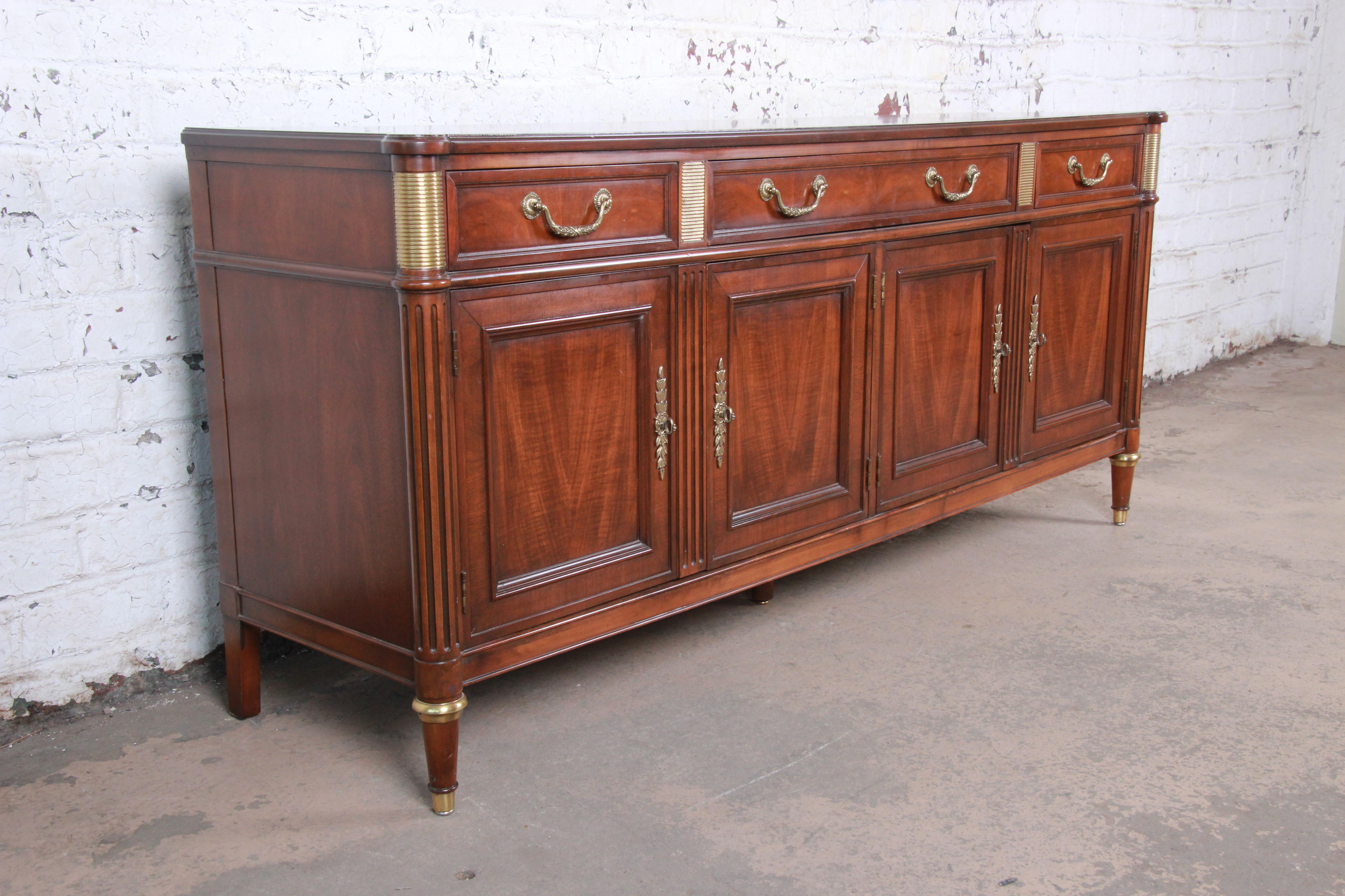 20th Century Baker Furniture French Louis XVI Directoire Style Walnut and Brass Sideboard