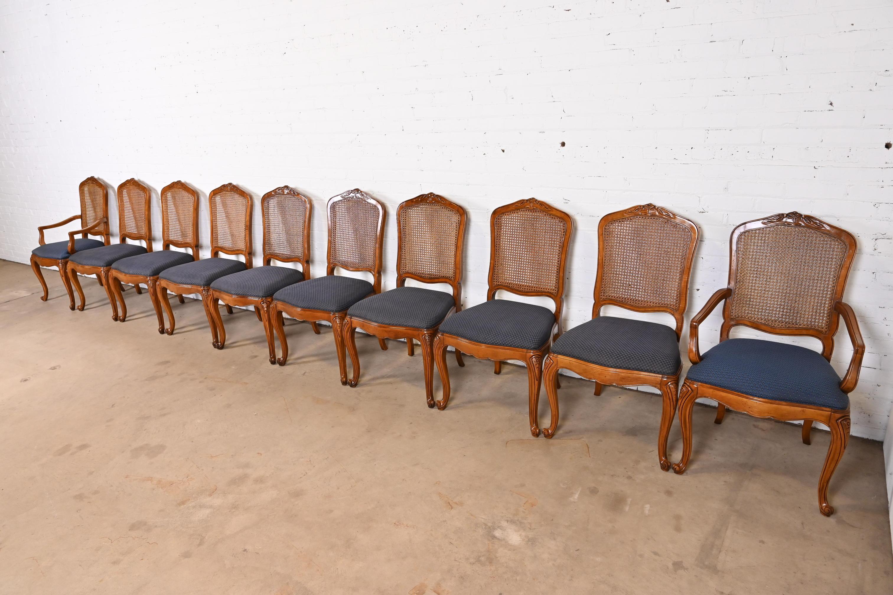 20th Century Baker Furniture French Provincial Carved Cherry Wood and Cane Dining Chairs