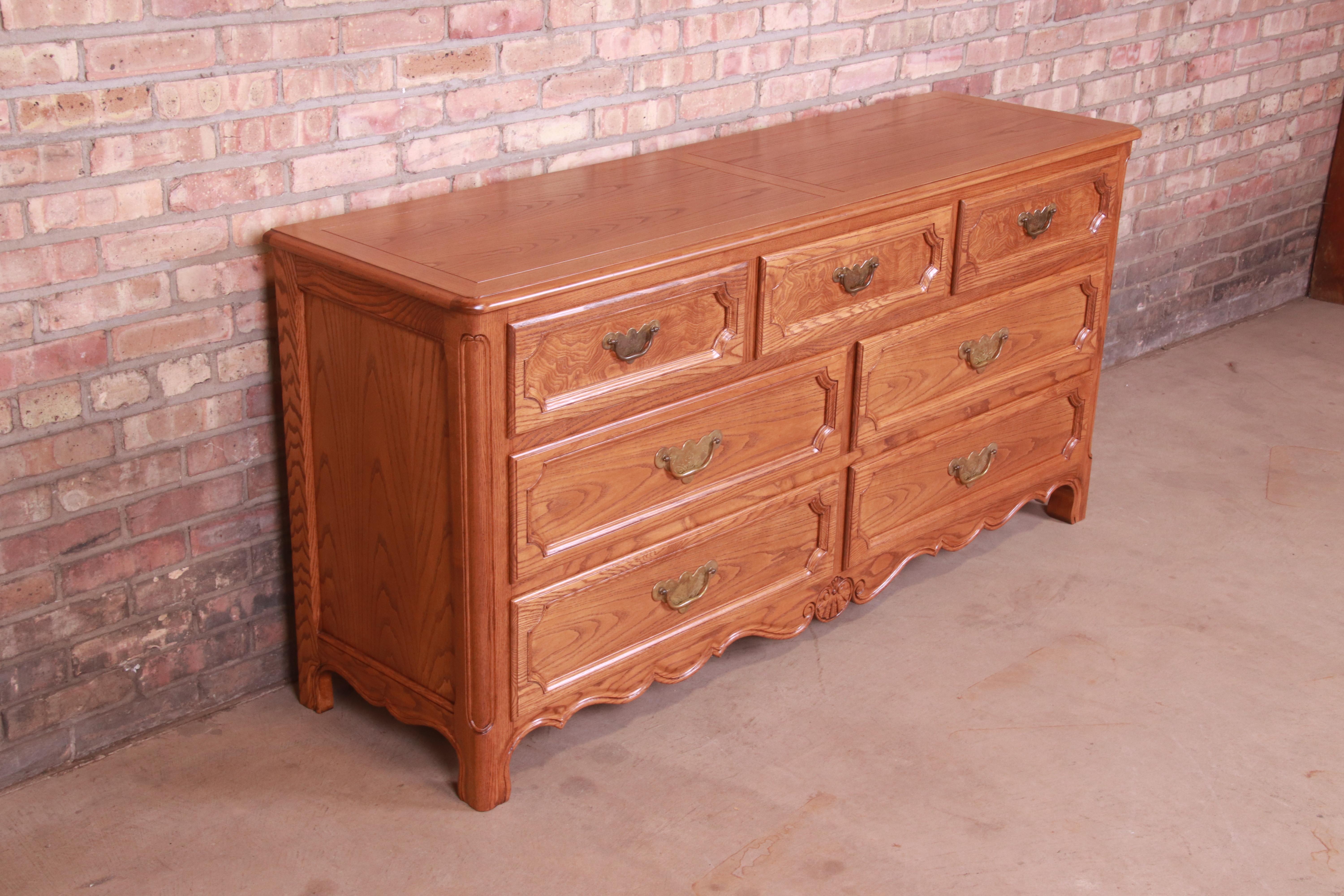 American Baker Furniture French Provincial Carved Oak and Burl Wood Dresser, Refinished For Sale