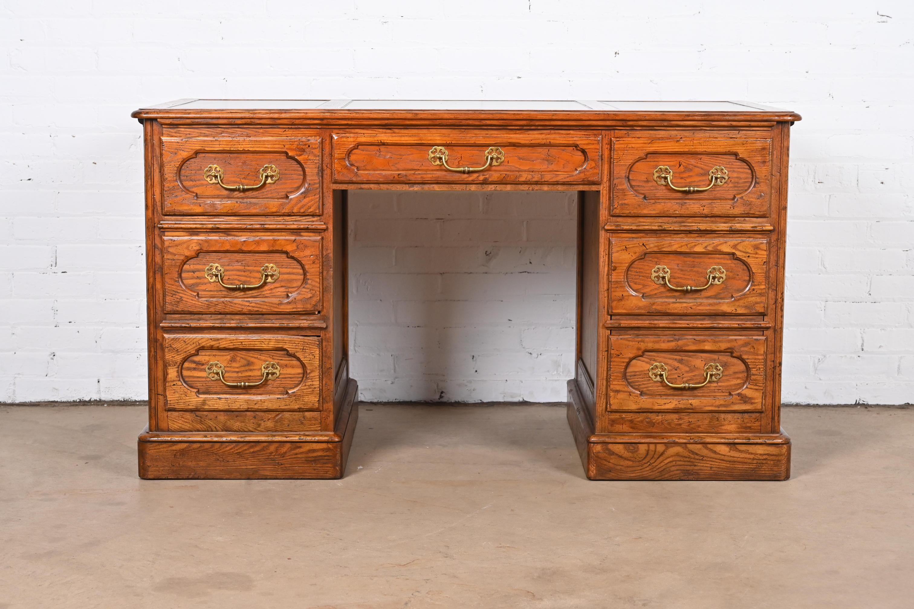 American Baker Furniture French Provincial Carved Oak Leather Top Desk, circa 1960s