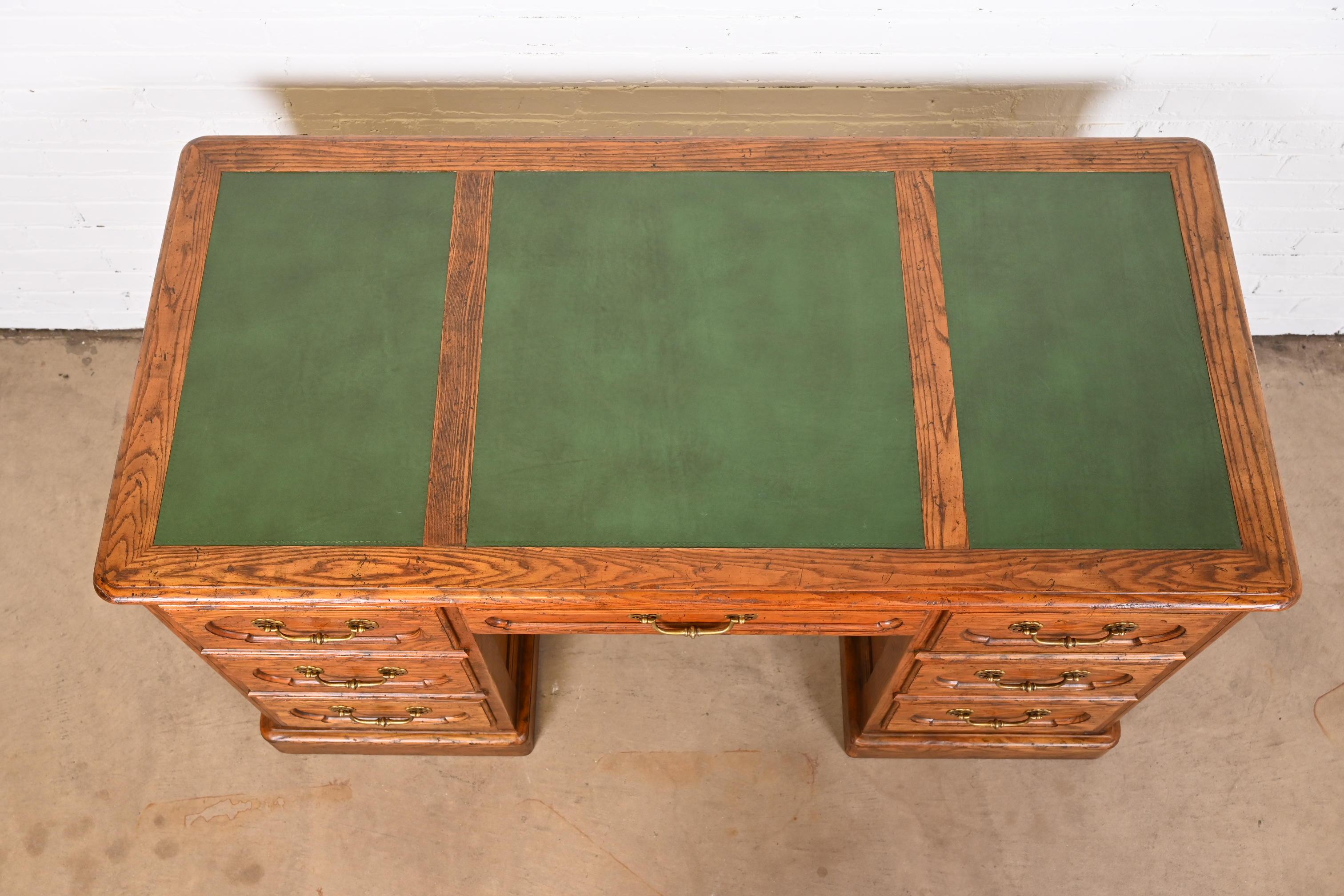 Baker Furniture French Provincial Carved Oak Leather Top Desk, circa 1960s 2
