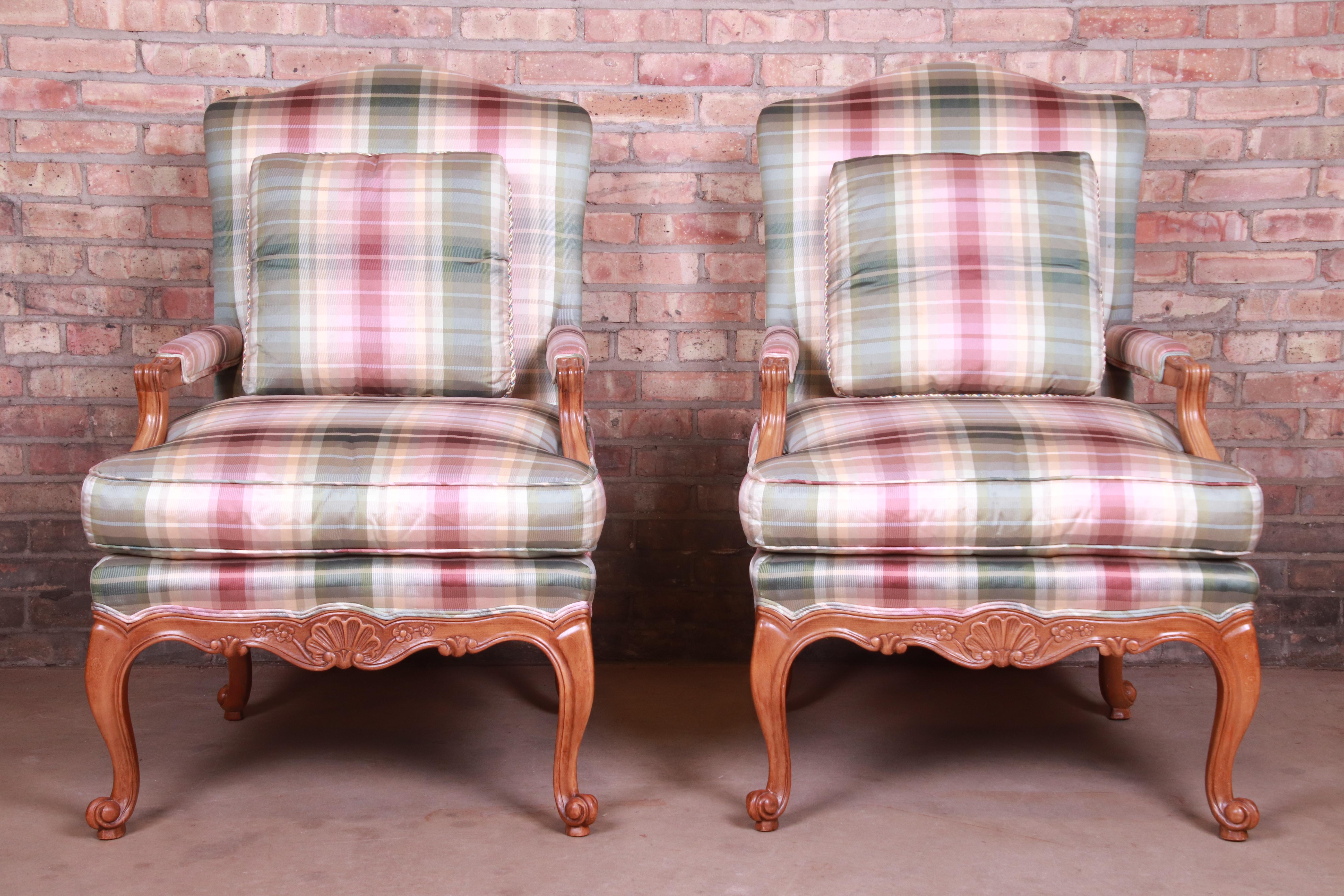An exceptional pair of French Provincial Louis XV style bergères

By Baker Furniture 