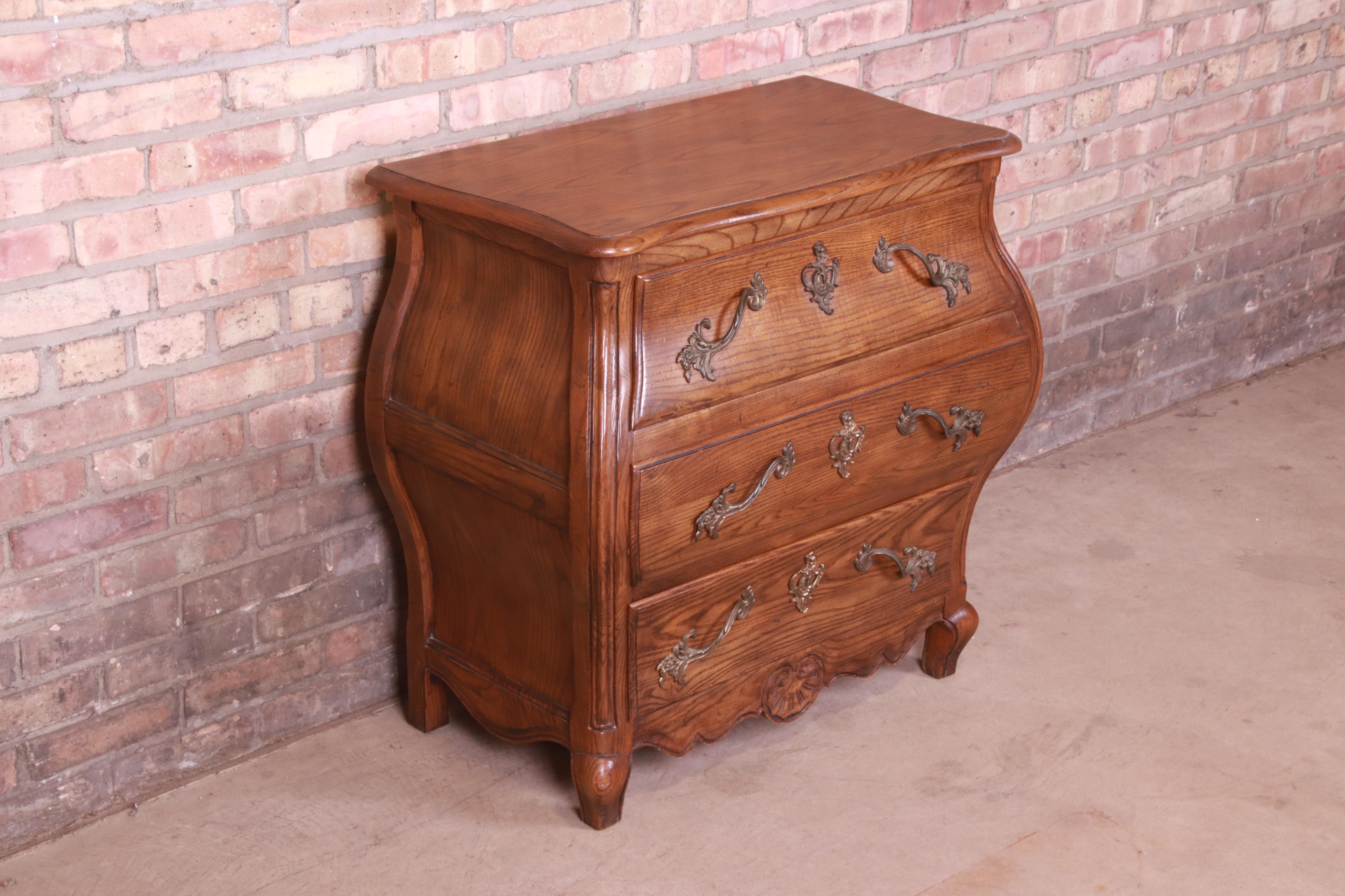 20th Century Baker Furniture French Provincial Louis XV Carved Oak Bombay Chest For Sale
