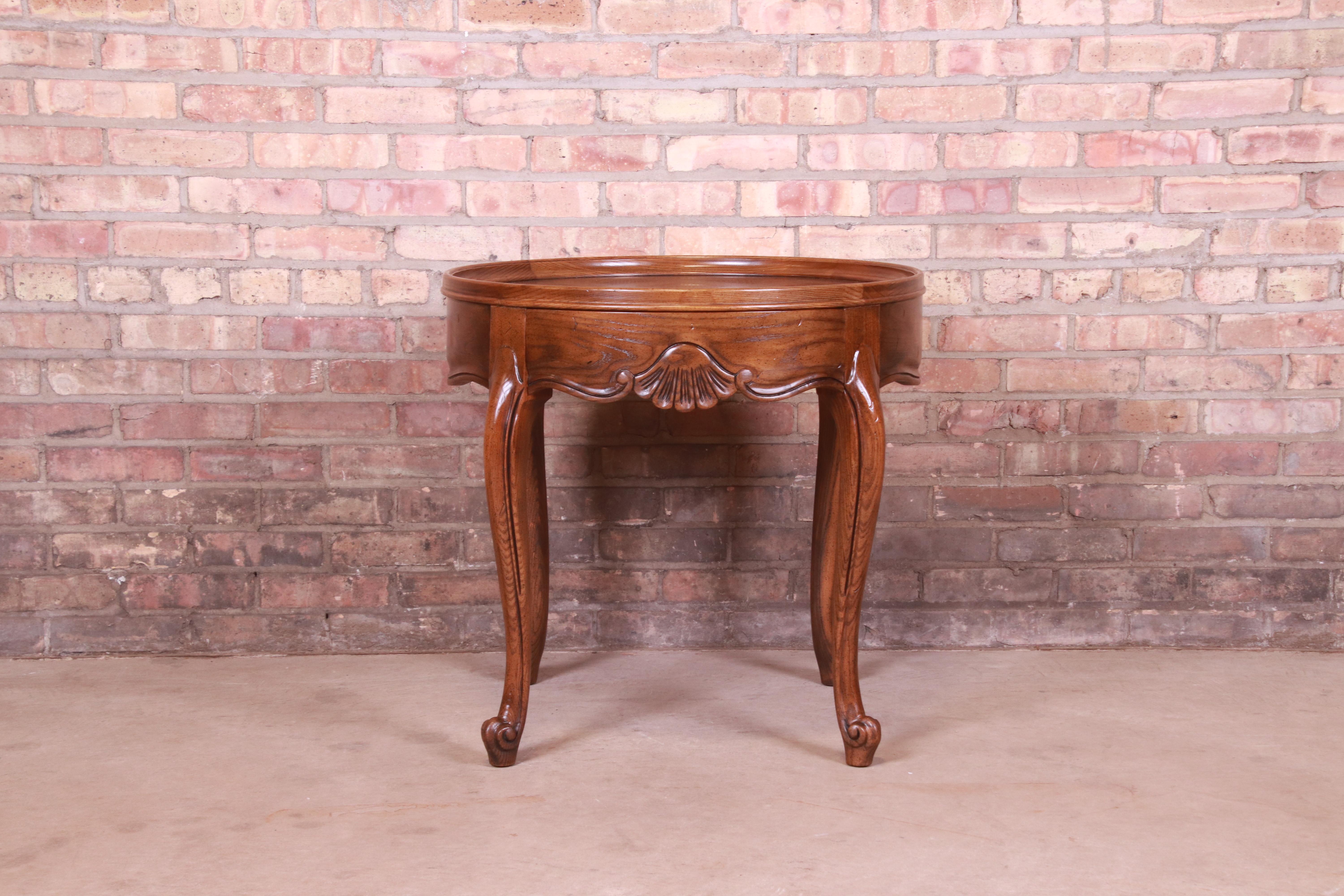 American Baker Furniture French Provincial Louis XV Carved Oak Tea Table, Circa 1960s