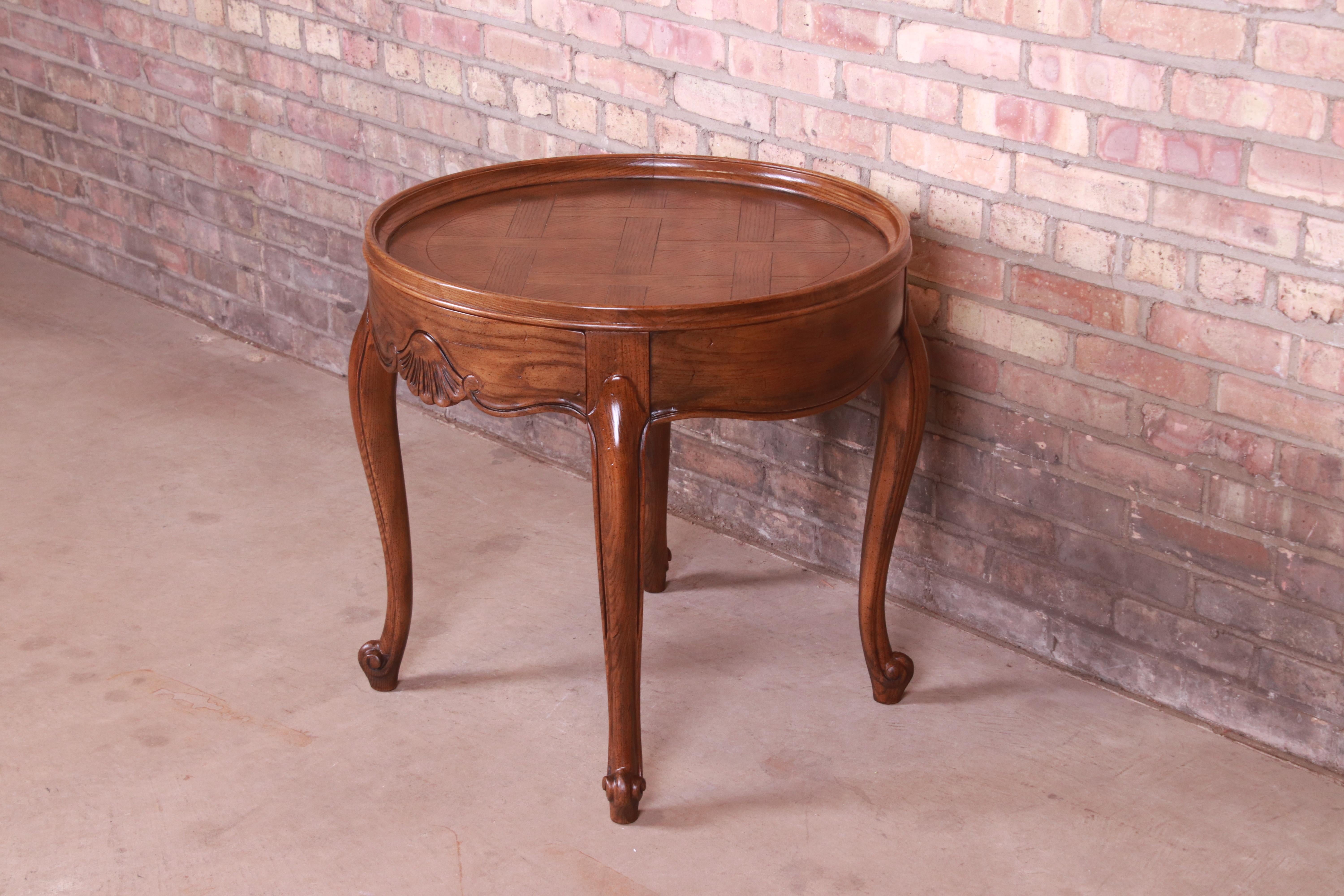 20th Century Baker Furniture French Provincial Louis XV Carved Oak Tea Table, Circa 1960s