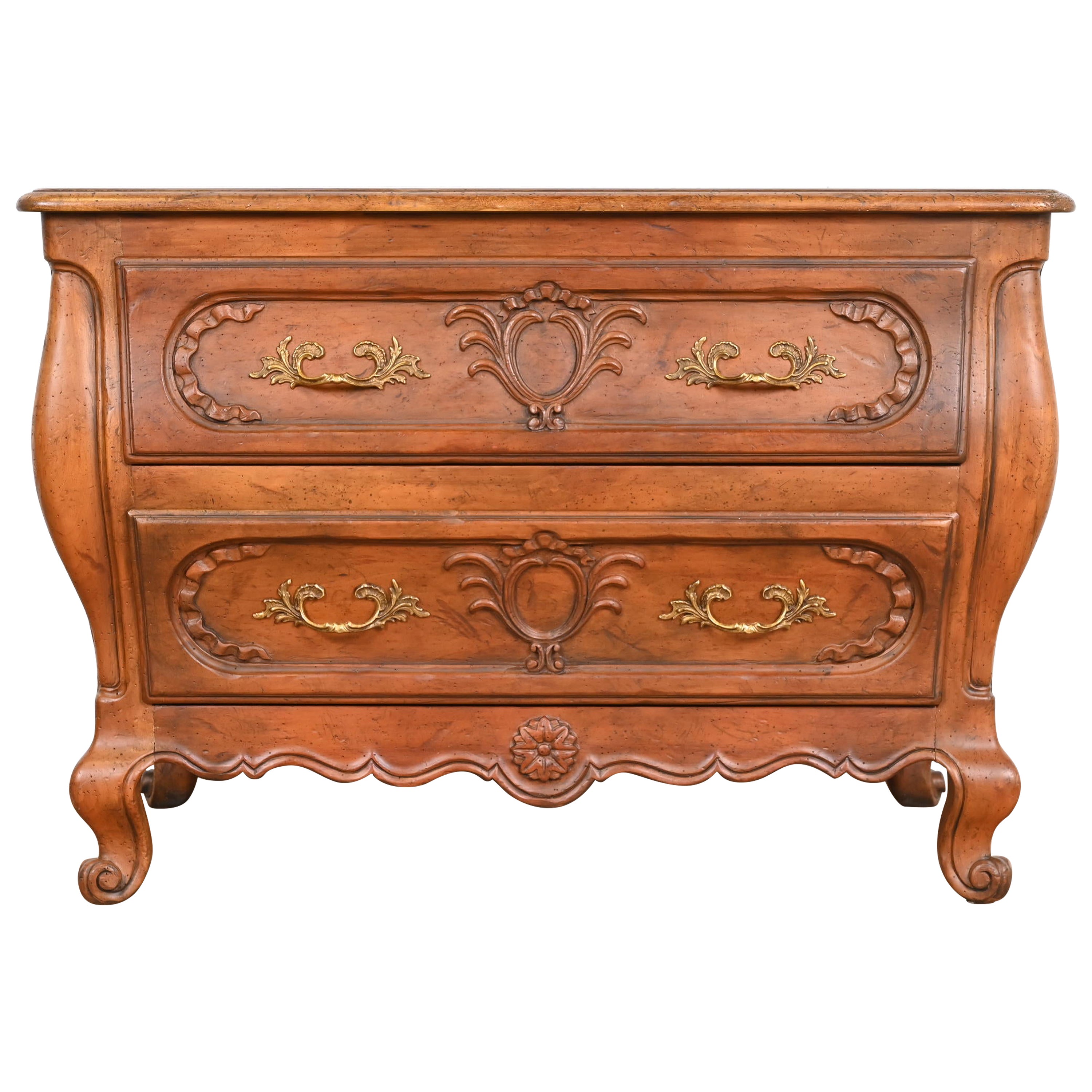Cassettiera in noce intagliata Baker Furniture French Provincial Louis XV