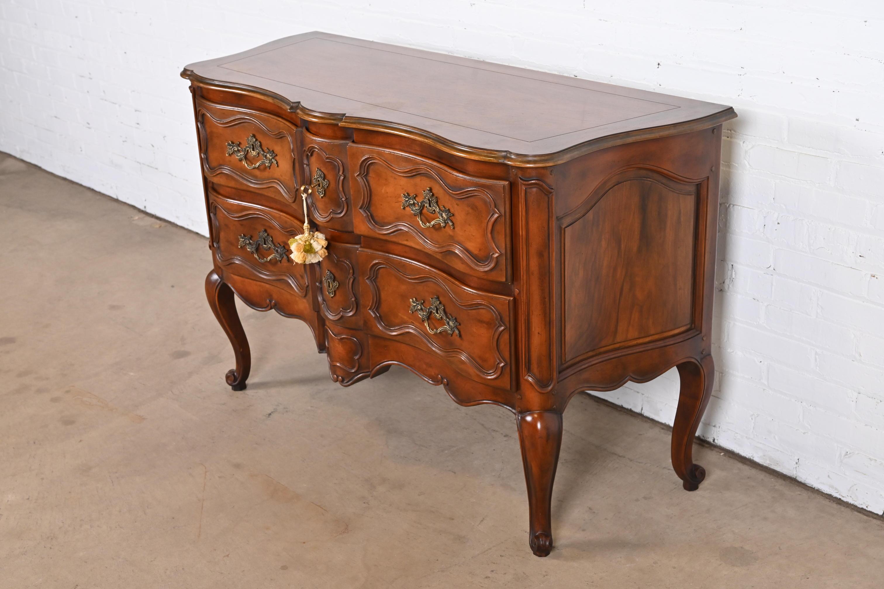 Mid-20th Century Baker Furniture French Provincial Louis XV Carved Walnut Commode or Sideboard