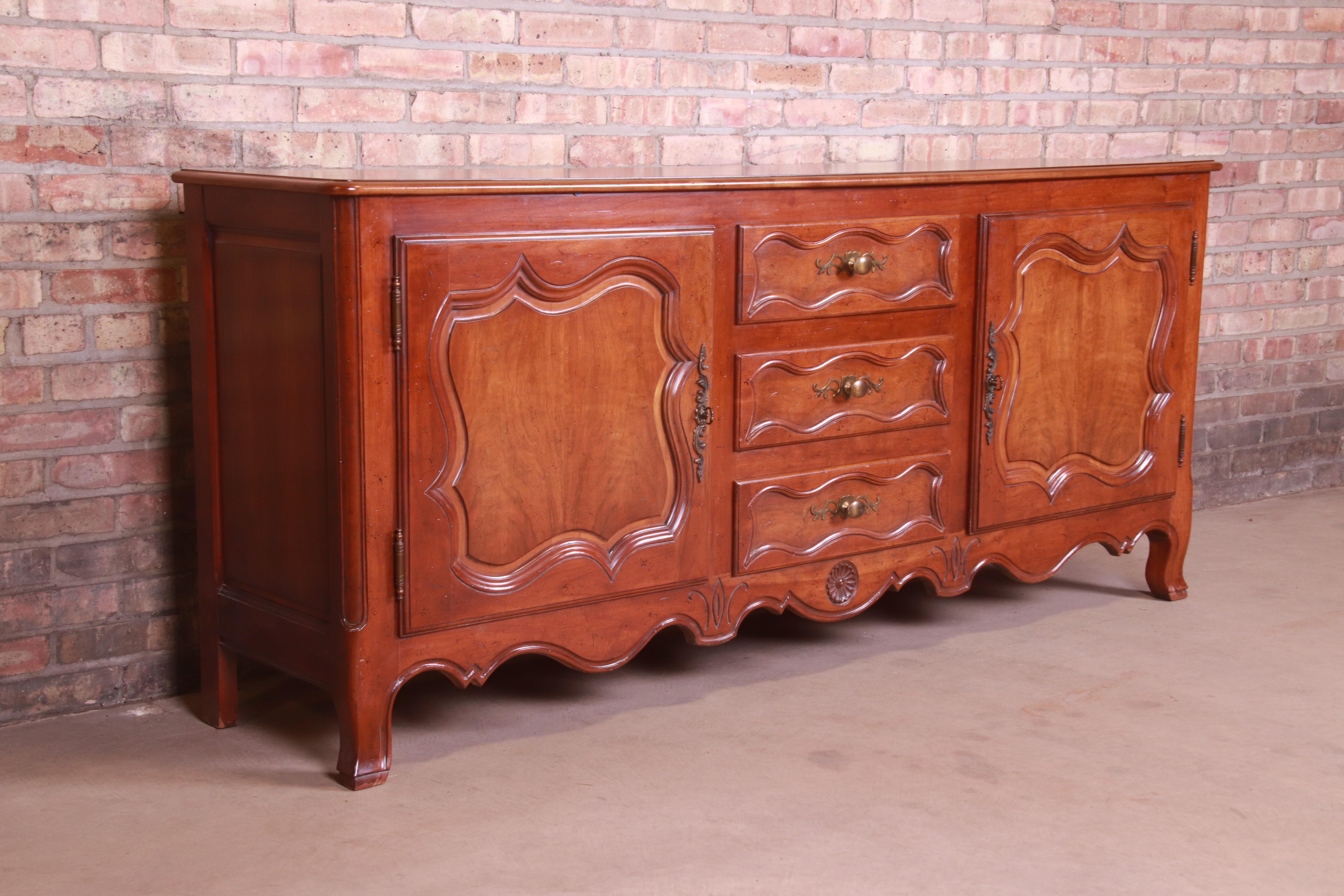American Baker Furniture French Provincial Louis XV Carved Walnut Sideboard, circa 1960s For Sale