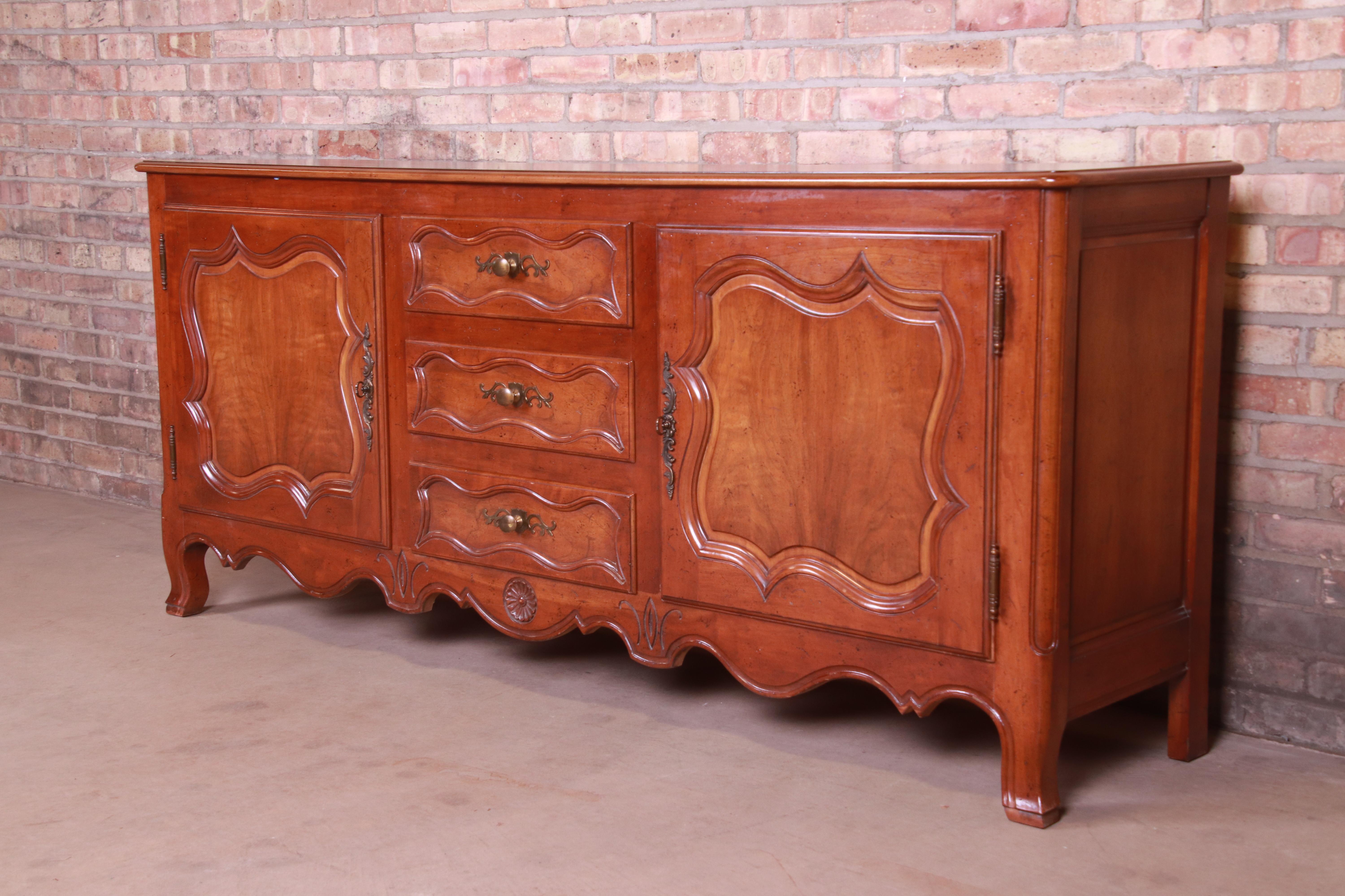Brass Baker Furniture French Provincial Louis XV Carved Walnut Sideboard, circa 1960s For Sale